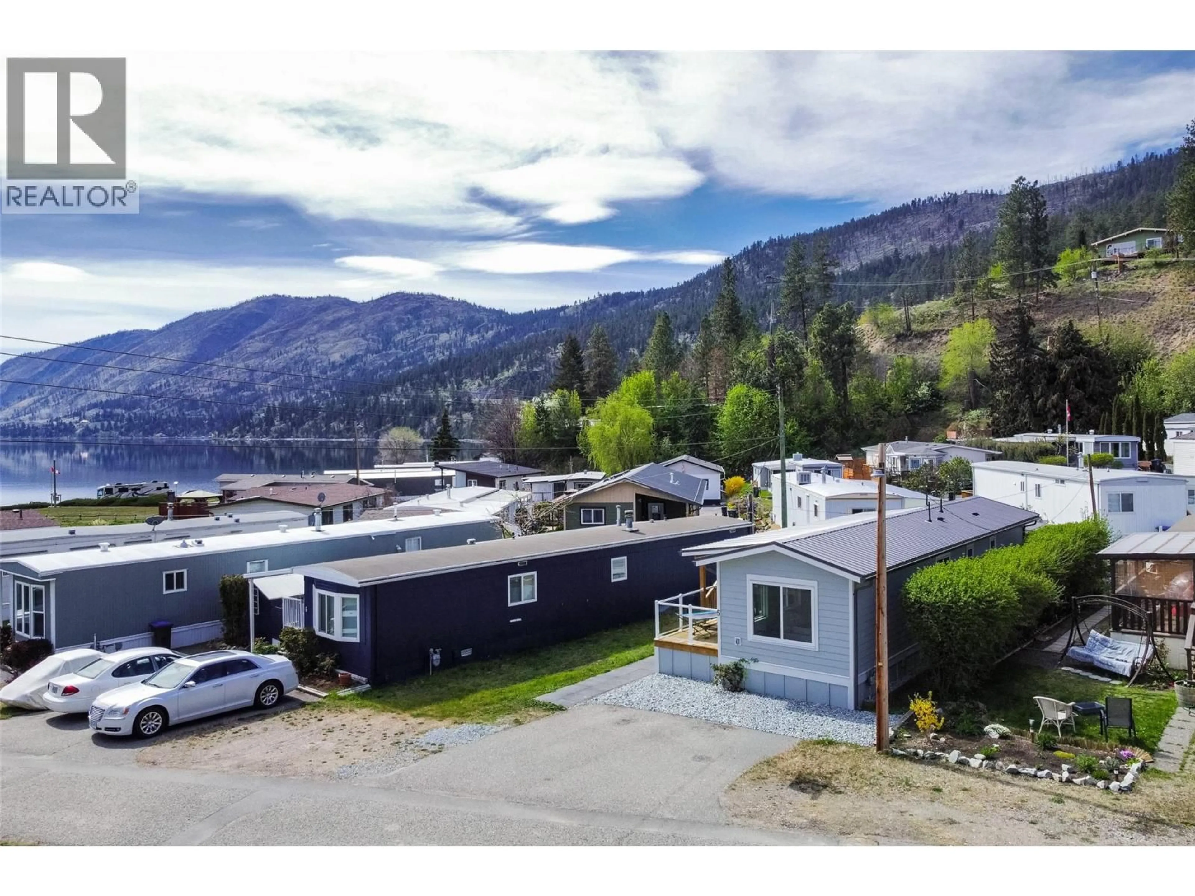 A pic from outside/outdoor area/front of a property/back of a property/a pic from drone, mountain view for 5 - 6711 HWY 97 SOUTH HIGHWAY, Peachland British Columbia V0H1X9