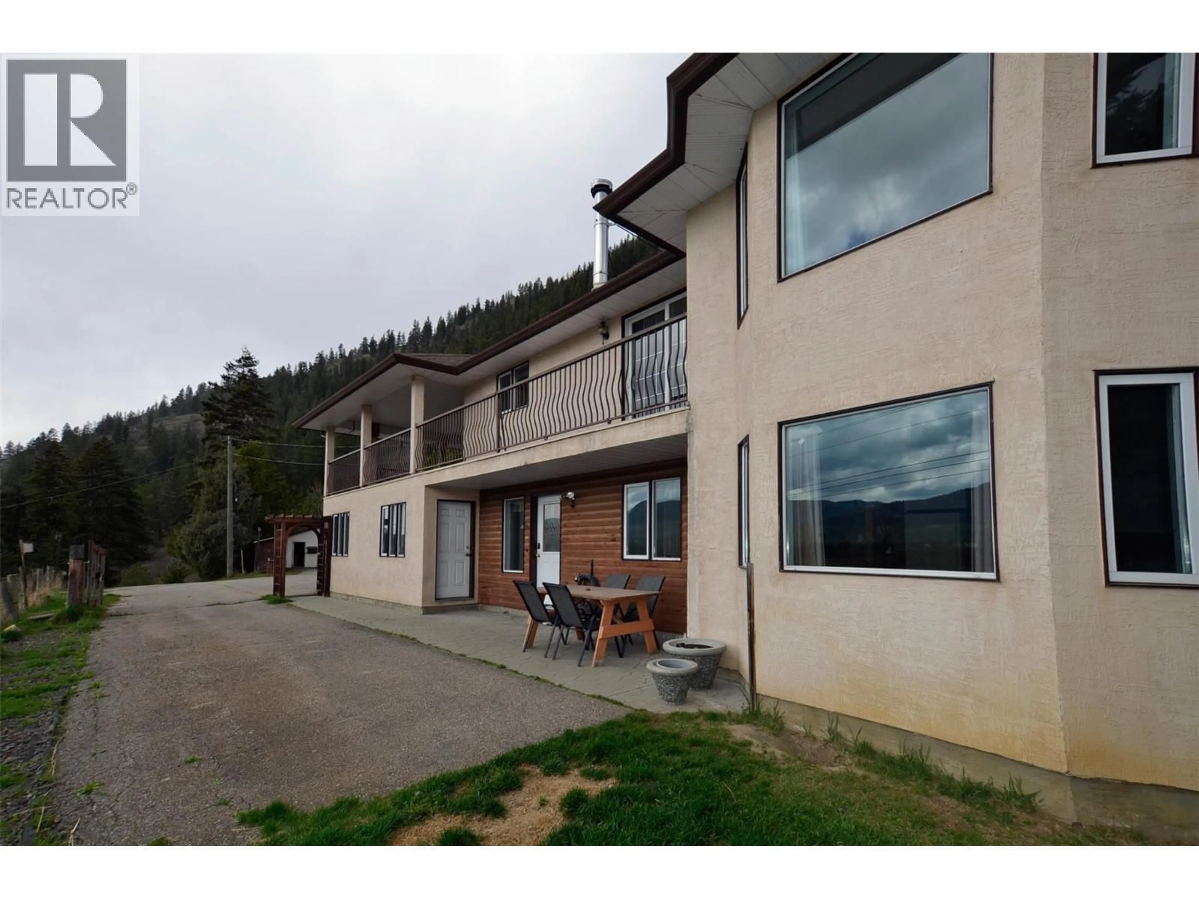 A pic from outside/outdoor area/front of a property/back of a property/a pic from drone, unknown for 3421 HIGHWAY 6 HIGHWAY, Lumby British Columbia V0E2G7