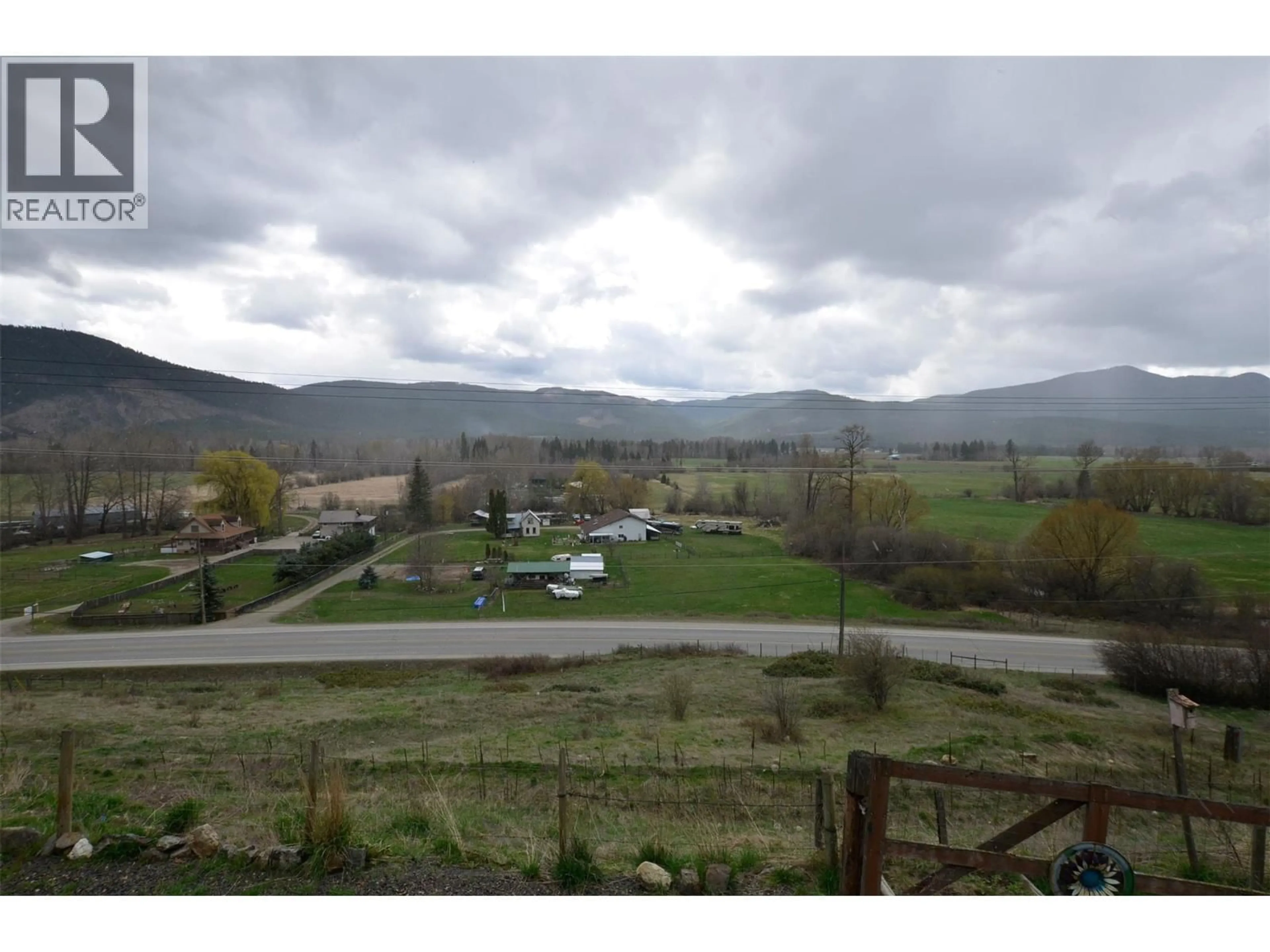 A pic from outside/outdoor area/front of a property/back of a property/a pic from drone, mountain view for 3421 HIGHWAY 6 HIGHWAY, Lumby British Columbia V0E2G7