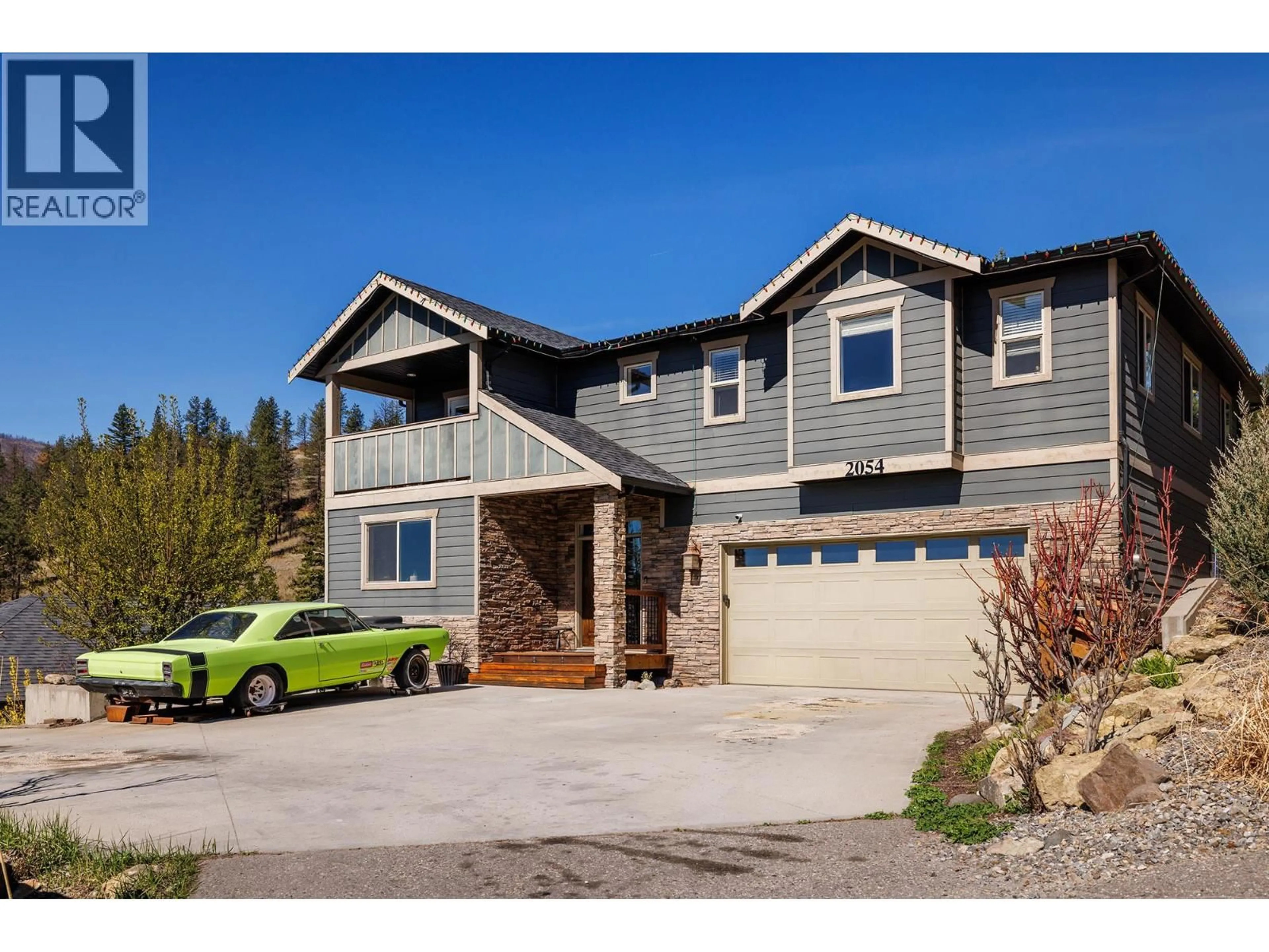 Home with vinyl exterior material, street for 2054 SUNVIEW DRIVE, West Kelowna British Columbia V1Z3X6