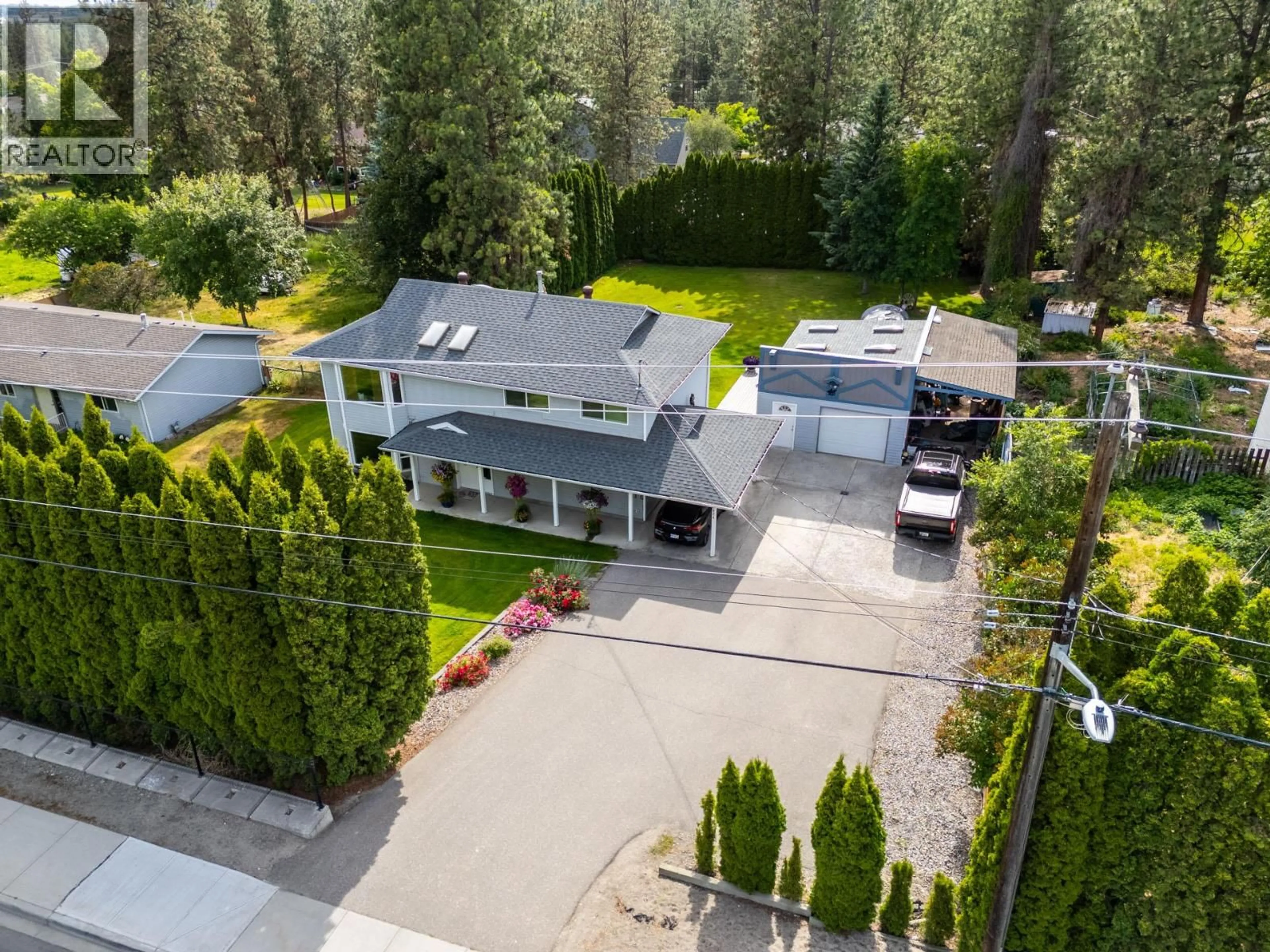 A pic from outside/outdoor area/front of a property/back of a property/a pic from drone, street for 3424 EAST BOUNDARY ROAD, Westbank British Columbia V4T2H4