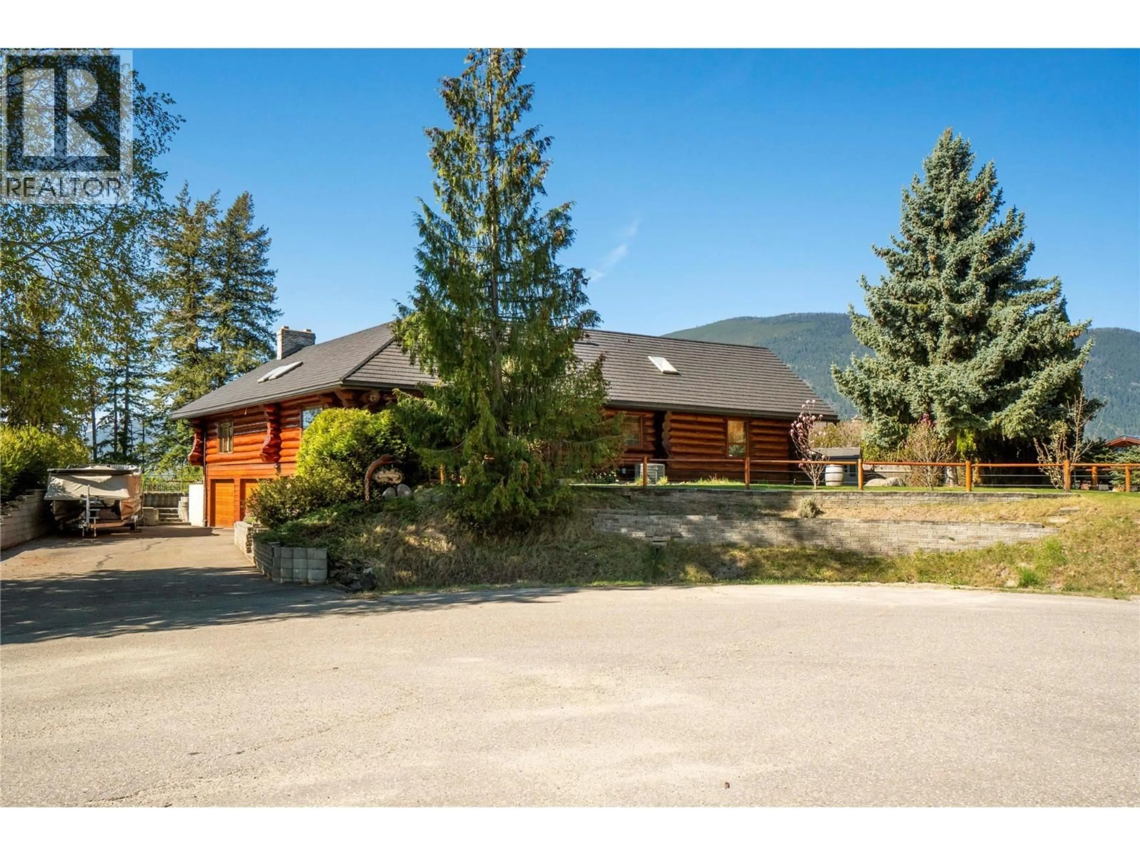 A pic from outside/outdoor area/front of a property/back of a property/a pic from drone, mountain view for 3660 BRAELYN ROAD, Tappen British Columbia V0E2X0