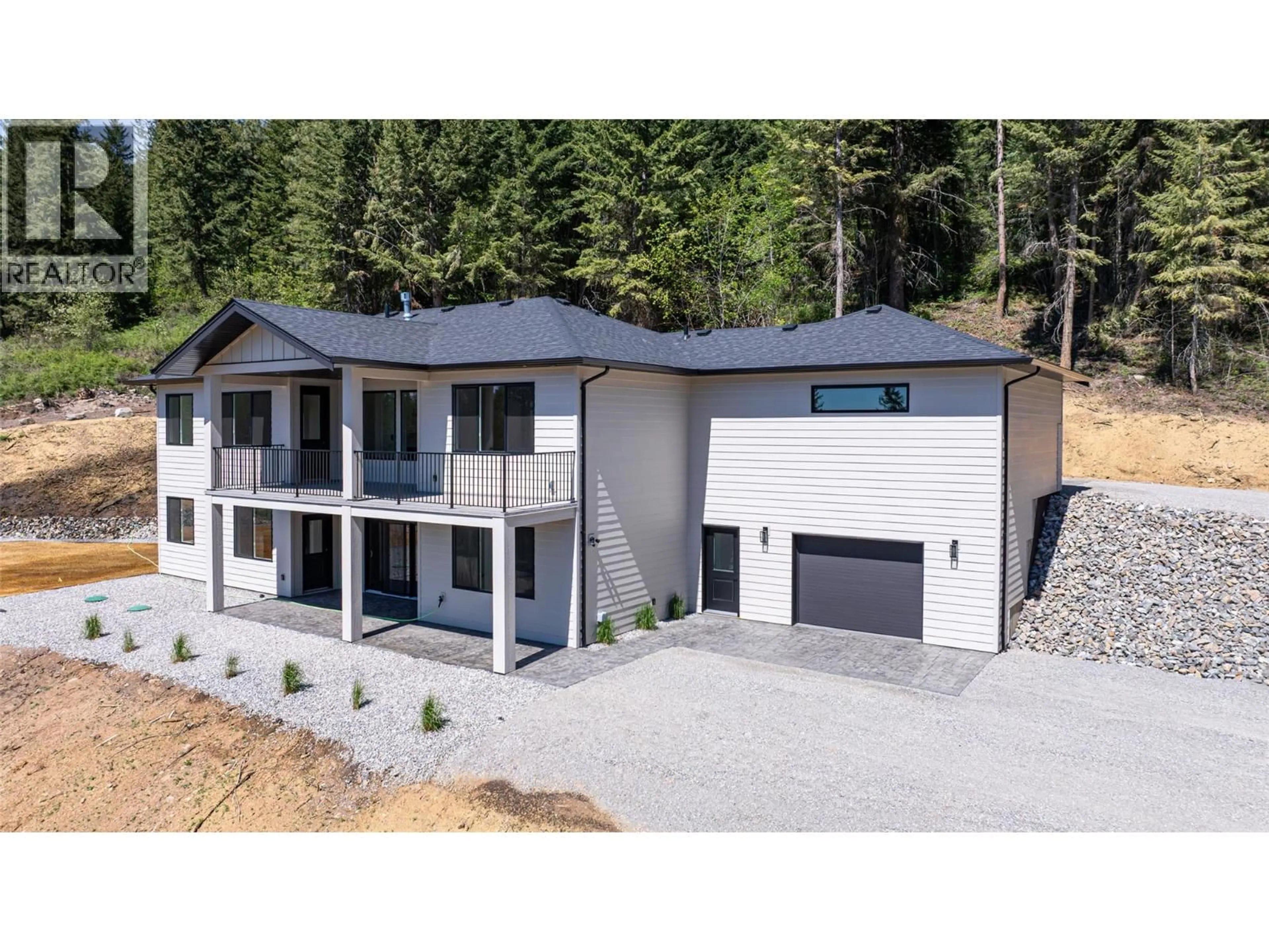 A pic from outside/outdoor area/front of a property/back of a property/a pic from drone, unknown for 7863 BOULTER ROAD, Vernon British Columbia V1B3N2