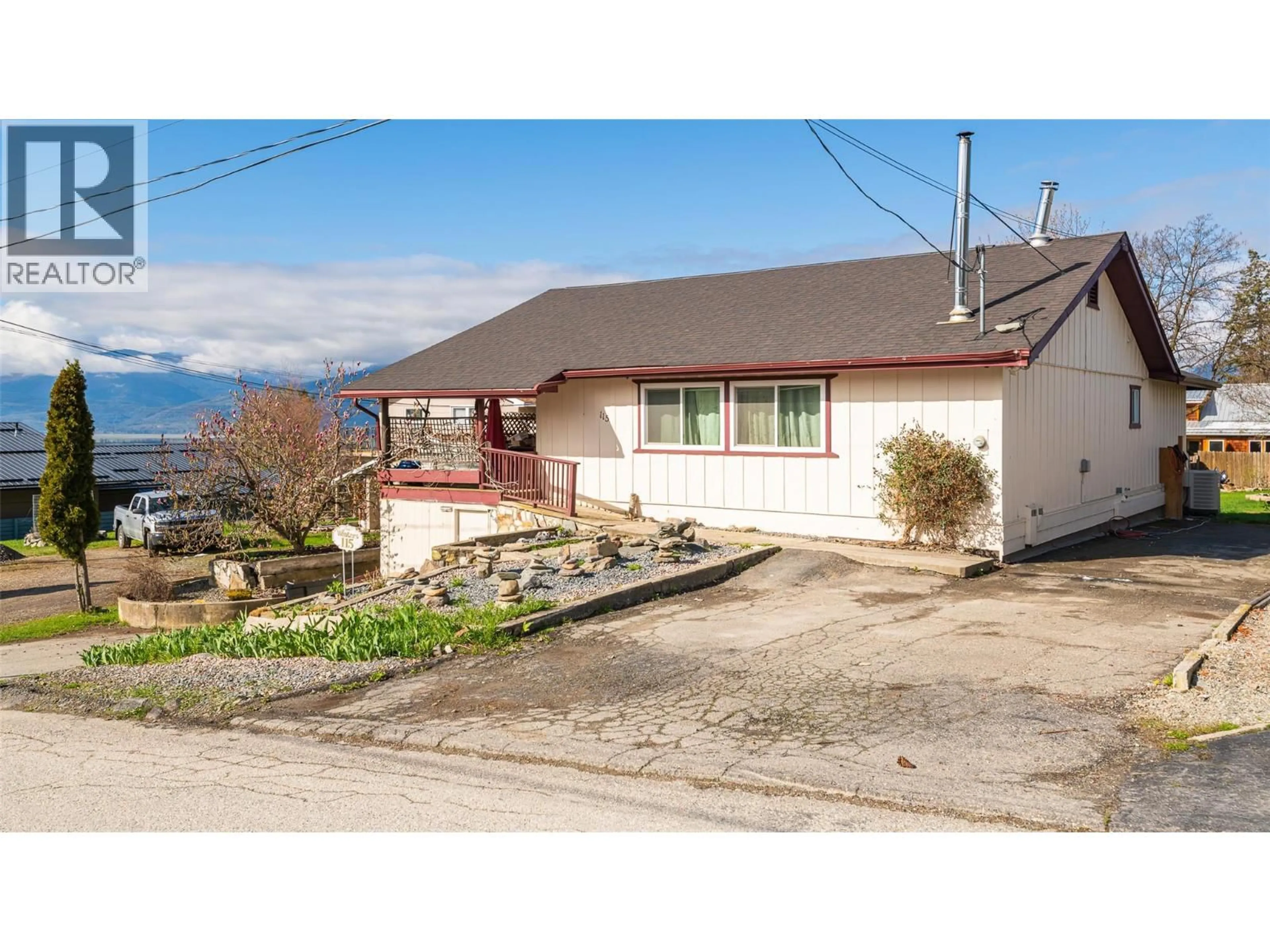 A pic from outside/outdoor area/front of a property/back of a property/a pic from drone, mountain view for 115 24TH AVENUE NORTH, Creston British Columbia V0B1G5
