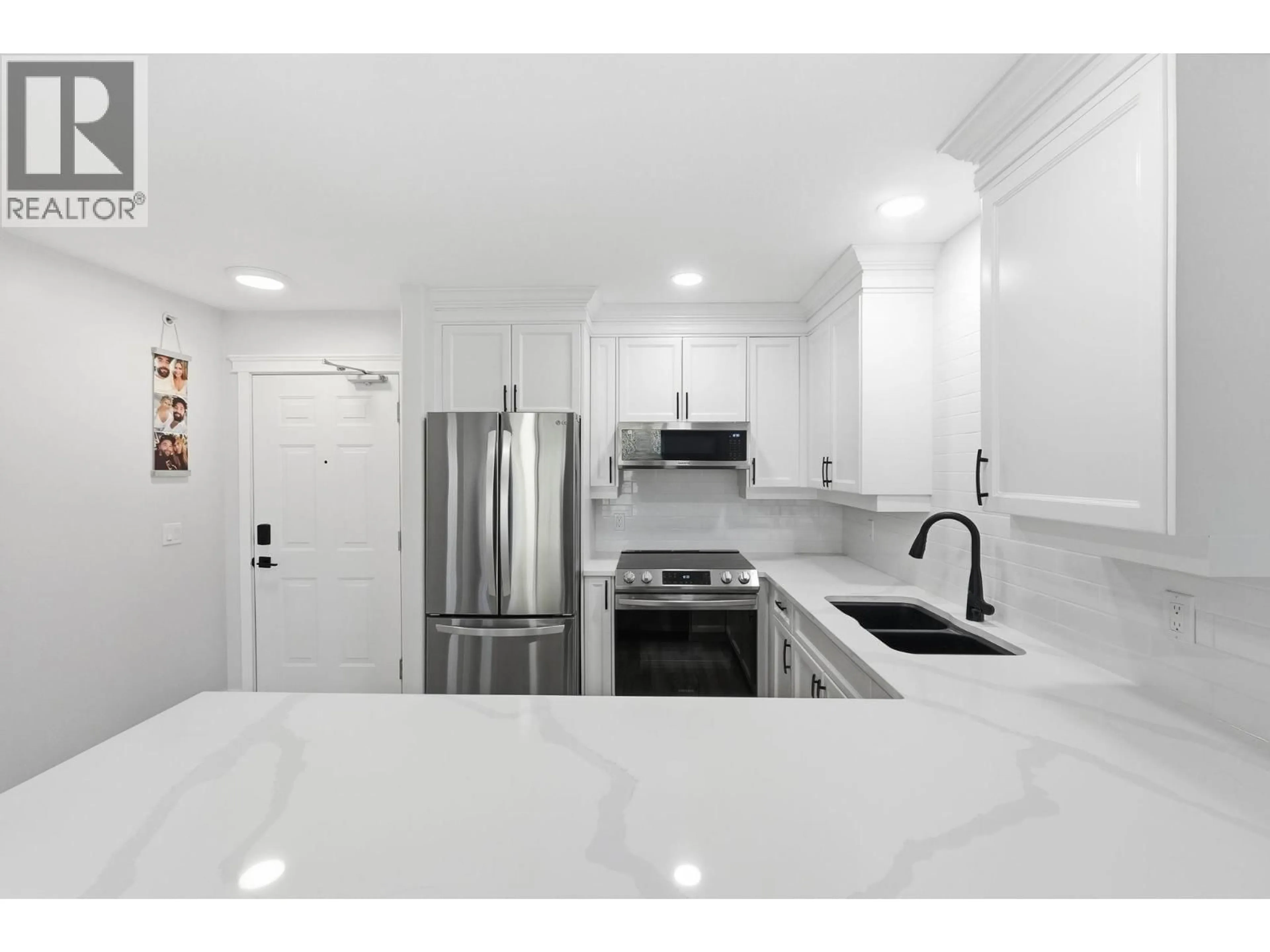 Unknown for 309 - 1965 PANDOSY STREET, Kelowna British Columbia V1Y1R9