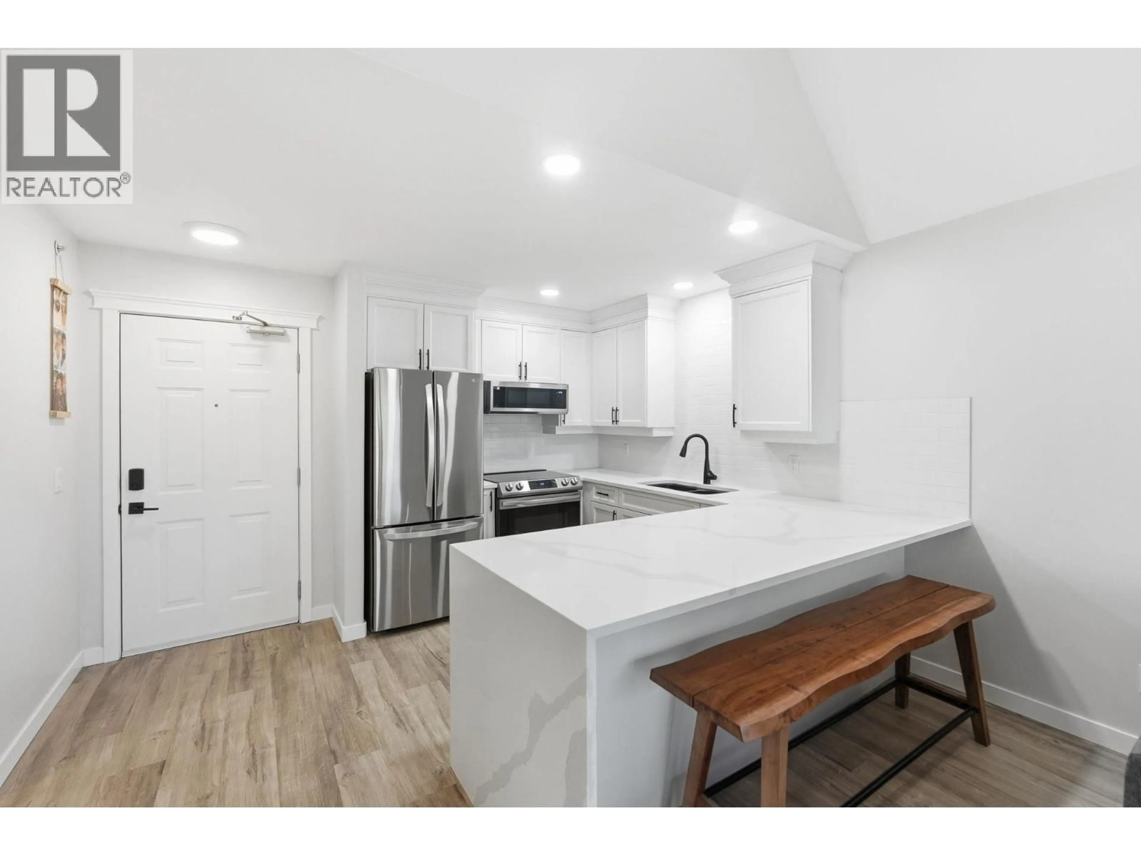 Open concept kitchen, unknown for 309 - 1965 PANDOSY STREET, Kelowna British Columbia V1Y1R9