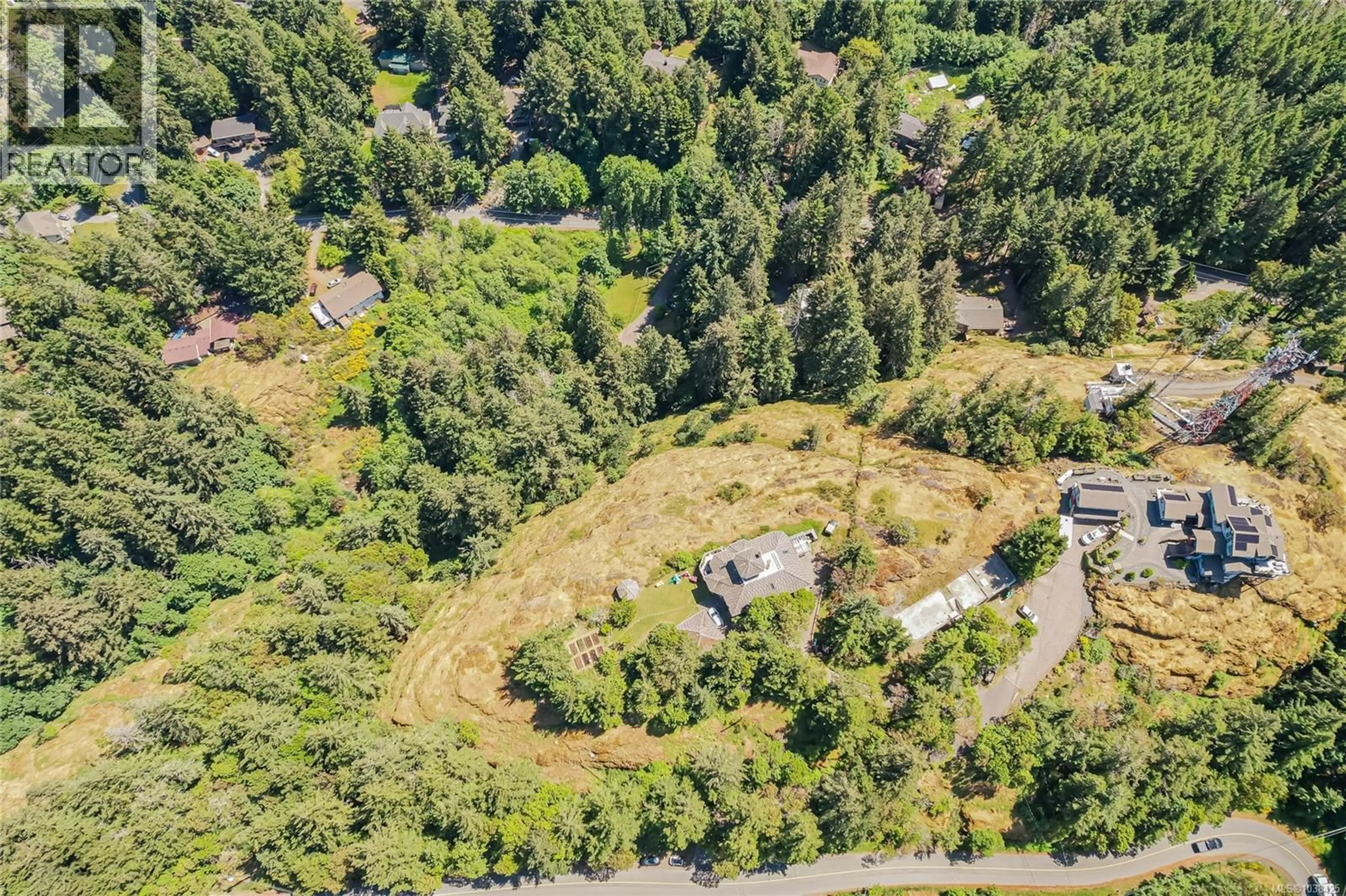 A pic from outside/outdoor area/front of a property/back of a property/a pic from drone, forest/trees view for 749 WALFRED ROAD, Langford British Columbia V9C2X3