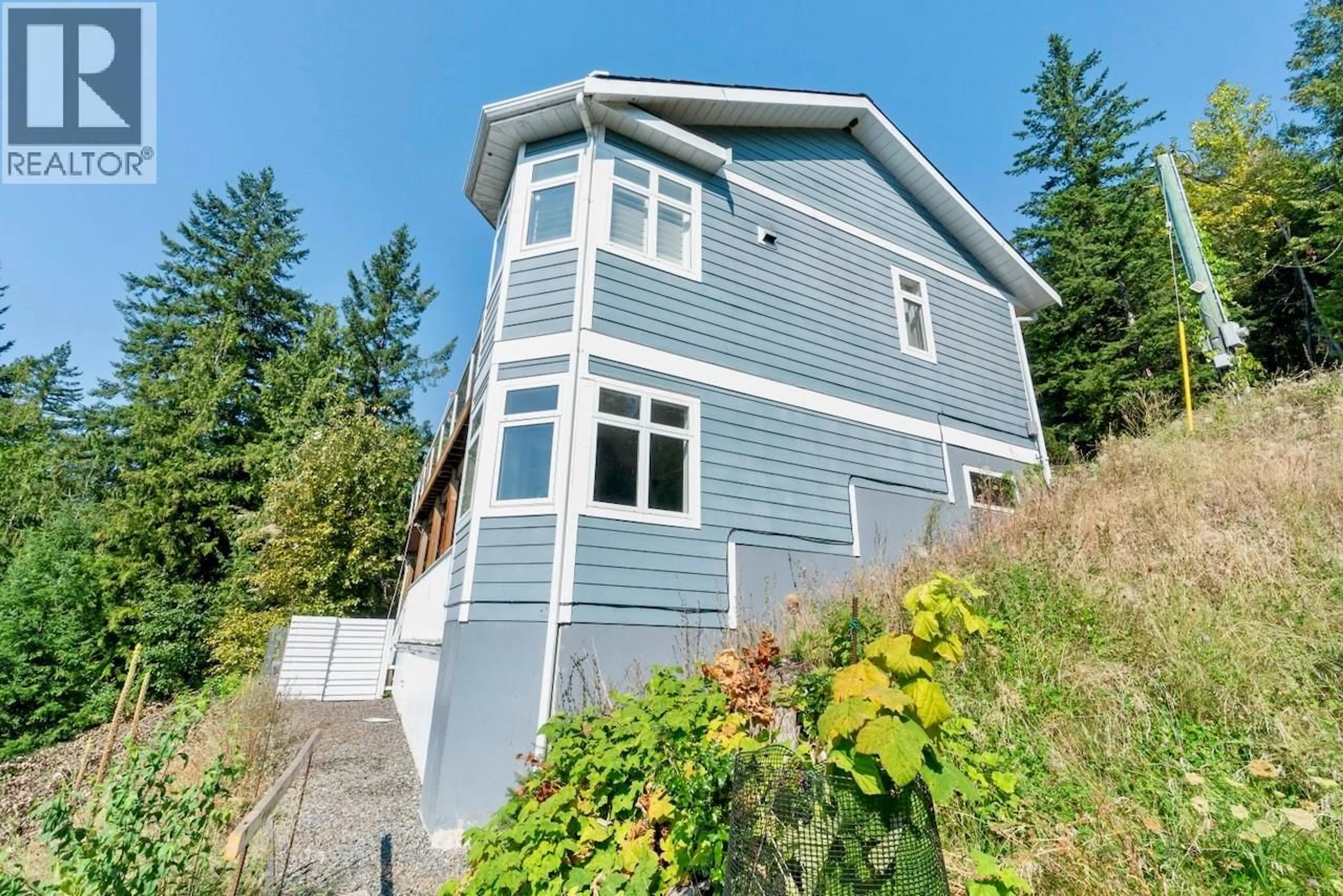 Home with vinyl exterior material, building for 7660 LICHEN ROAD, Anglemont British Columbia V0E1M8