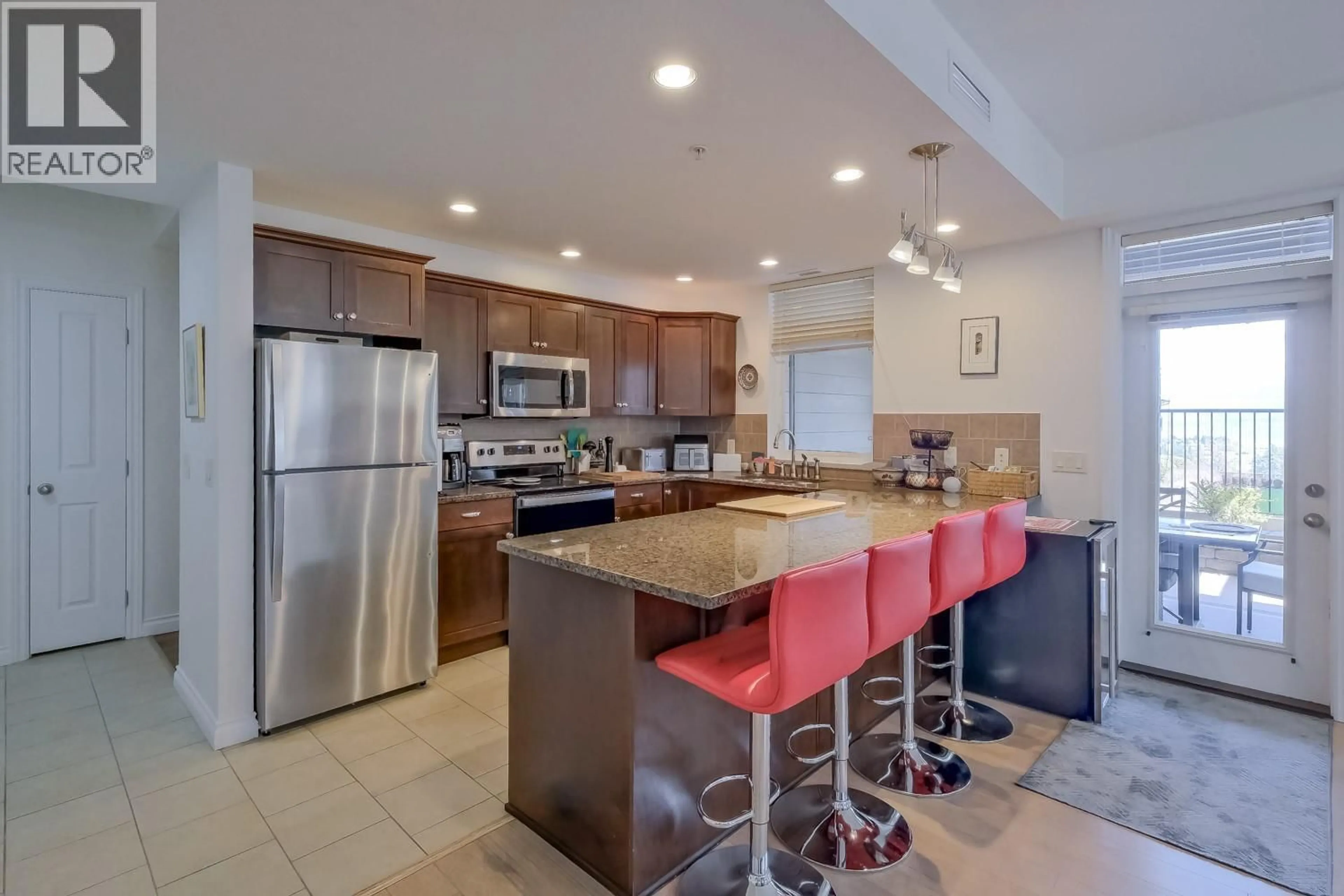 Open concept kitchen, ceramic/tile floor for 1113 - 3833 BROWN ROAD, West Kelowna British Columbia V4T2J3