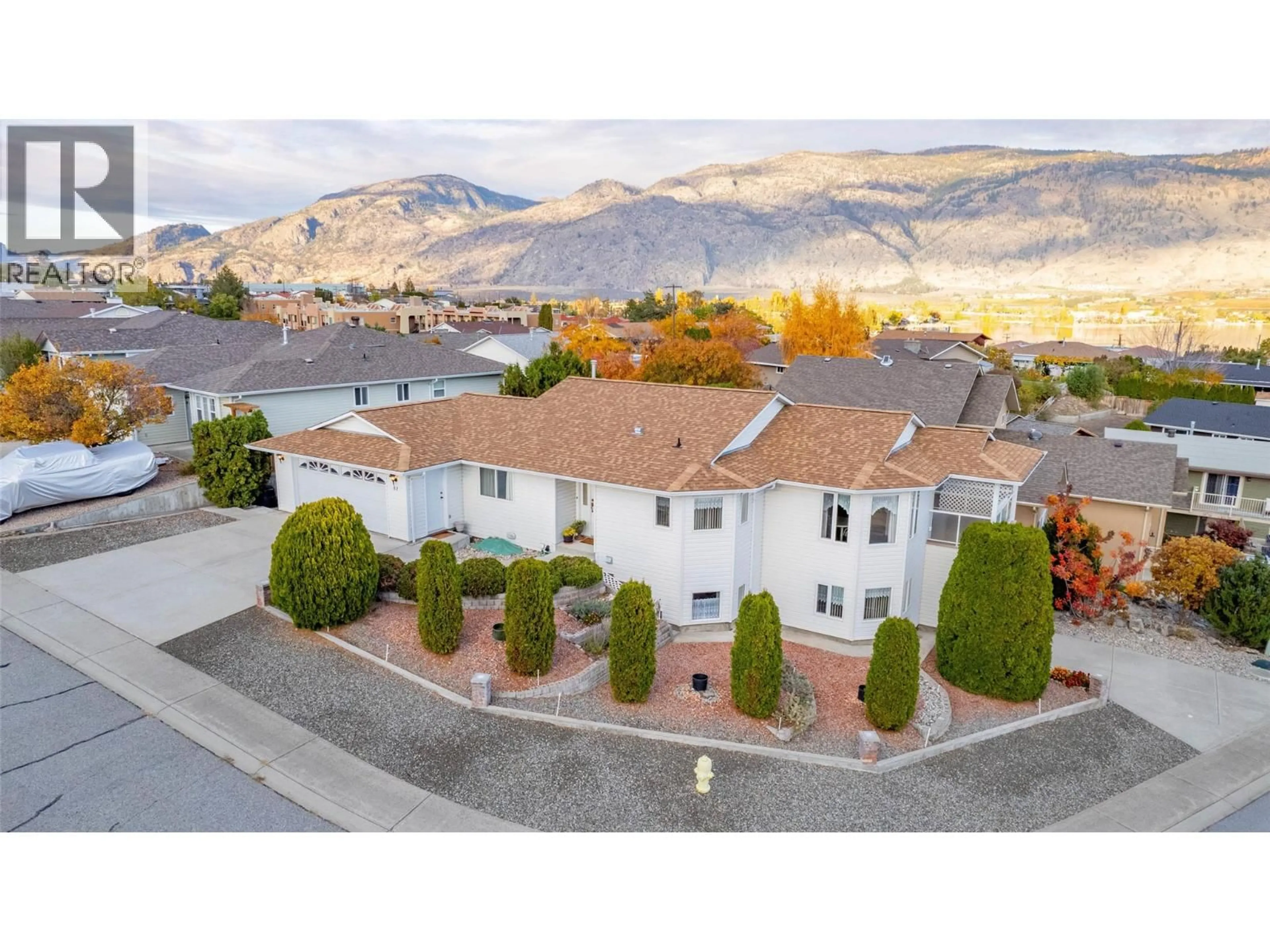 A pic from outside/outdoor area/front of a property/back of a property/a pic from drone, mountain view for 51 CACTUS CRESCENT, Osoyoos British Columbia V0H1V1