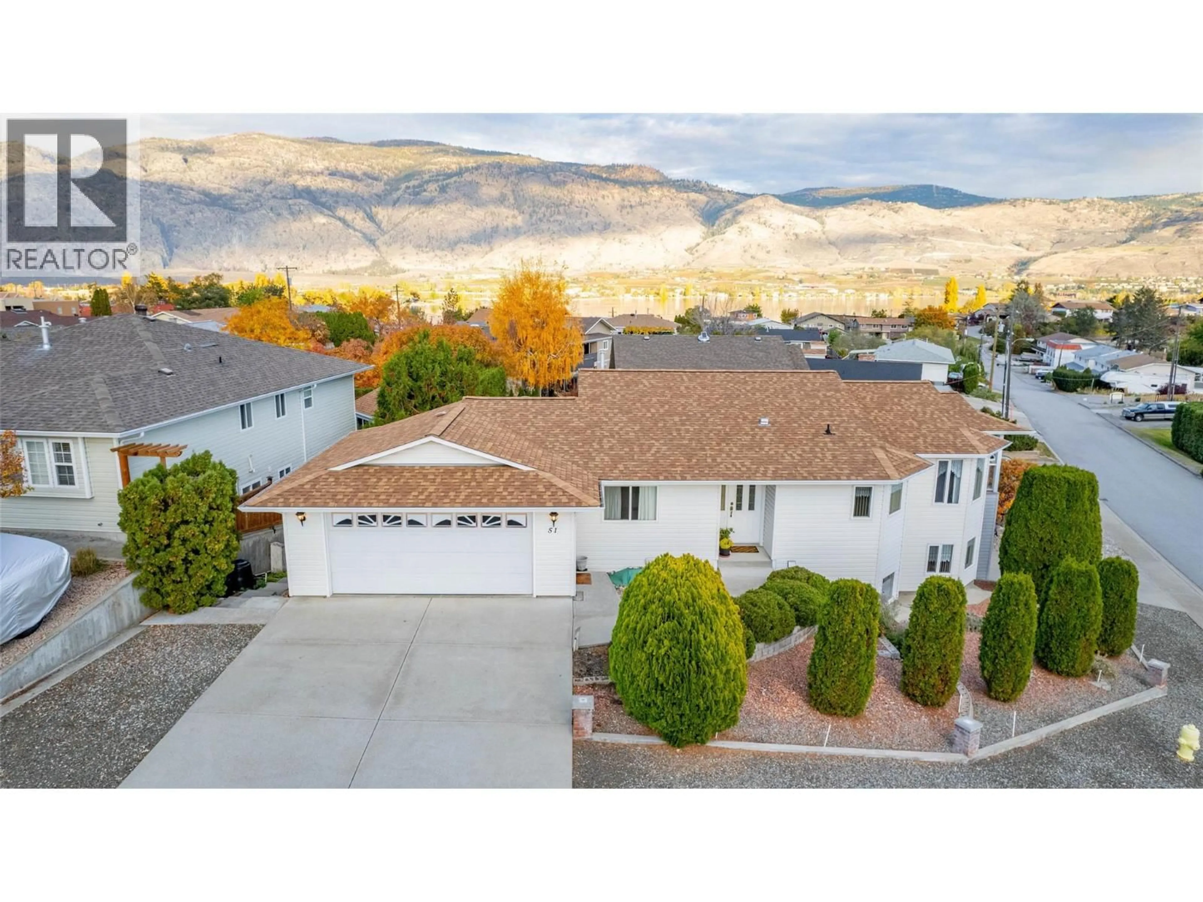 A pic from outside/outdoor area/front of a property/back of a property/a pic from drone, mountain view for 51 CACTUS CRESCENT, Osoyoos British Columbia V0H1V1