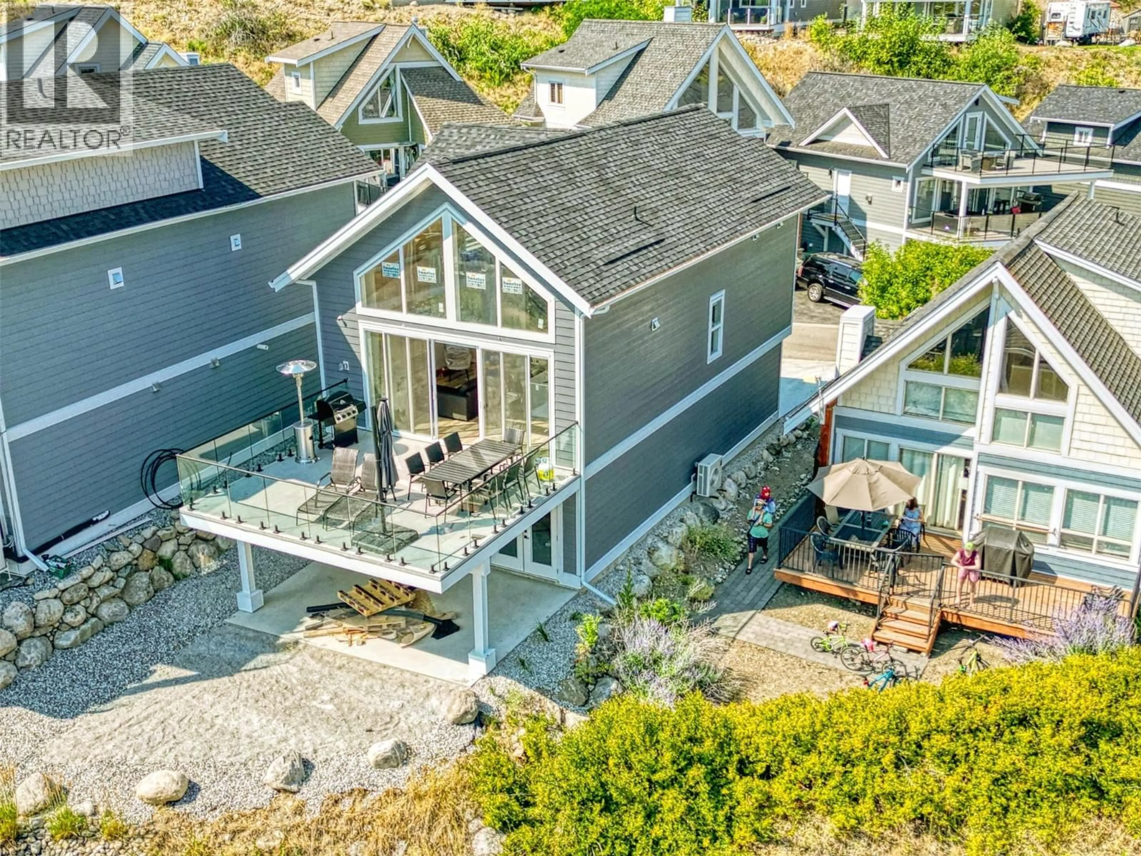 A pic from outside/outdoor area/front of a property/back of a property/a pic from drone, unknown for 149 - 6811 SANTIAGO LOOP, Kelowna British Columbia V1Z3R8