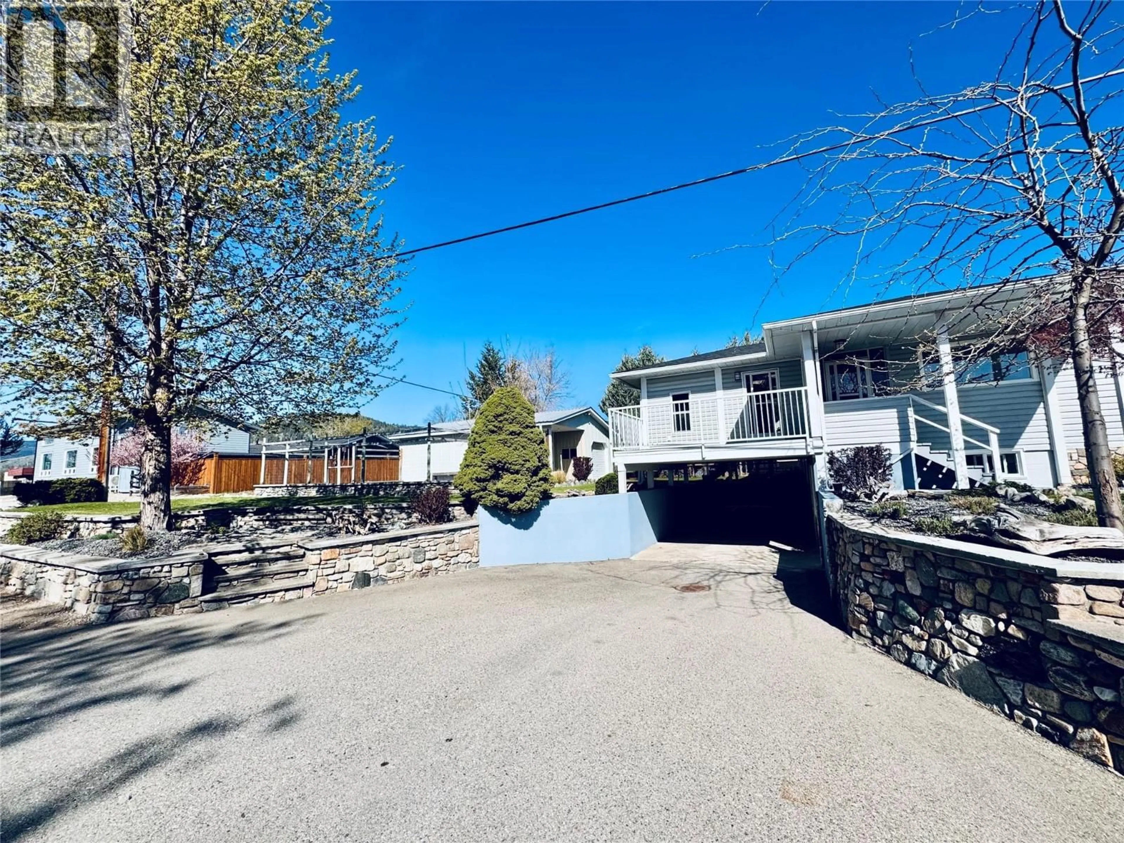 A pic from outside/outdoor area/front of a property/back of a property/a pic from drone, street for 7027 18TH STREET, Grand Forks British Columbia V0H1H2