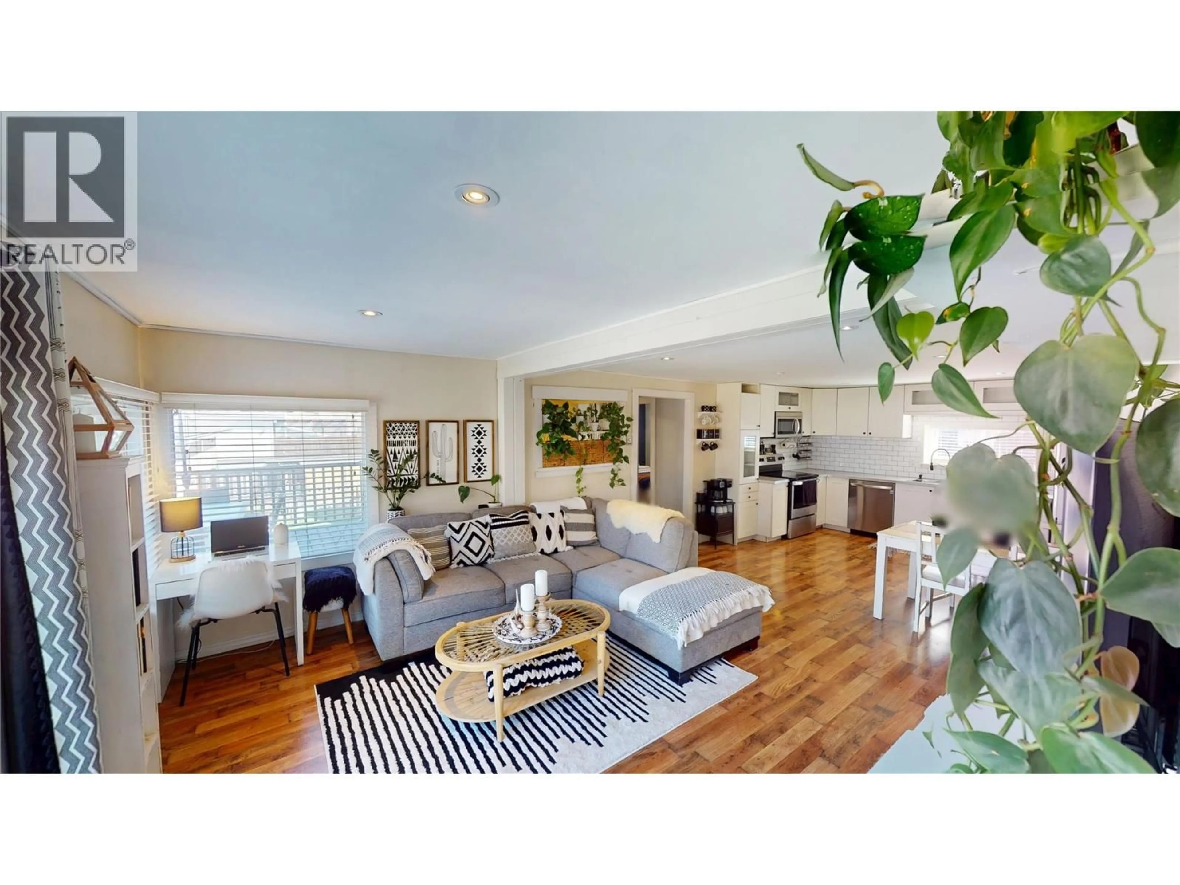 Living room with furniture, wood/laminate floor for 5728 VERMILLION STREET, Edgewater British Columbia V0A1E0