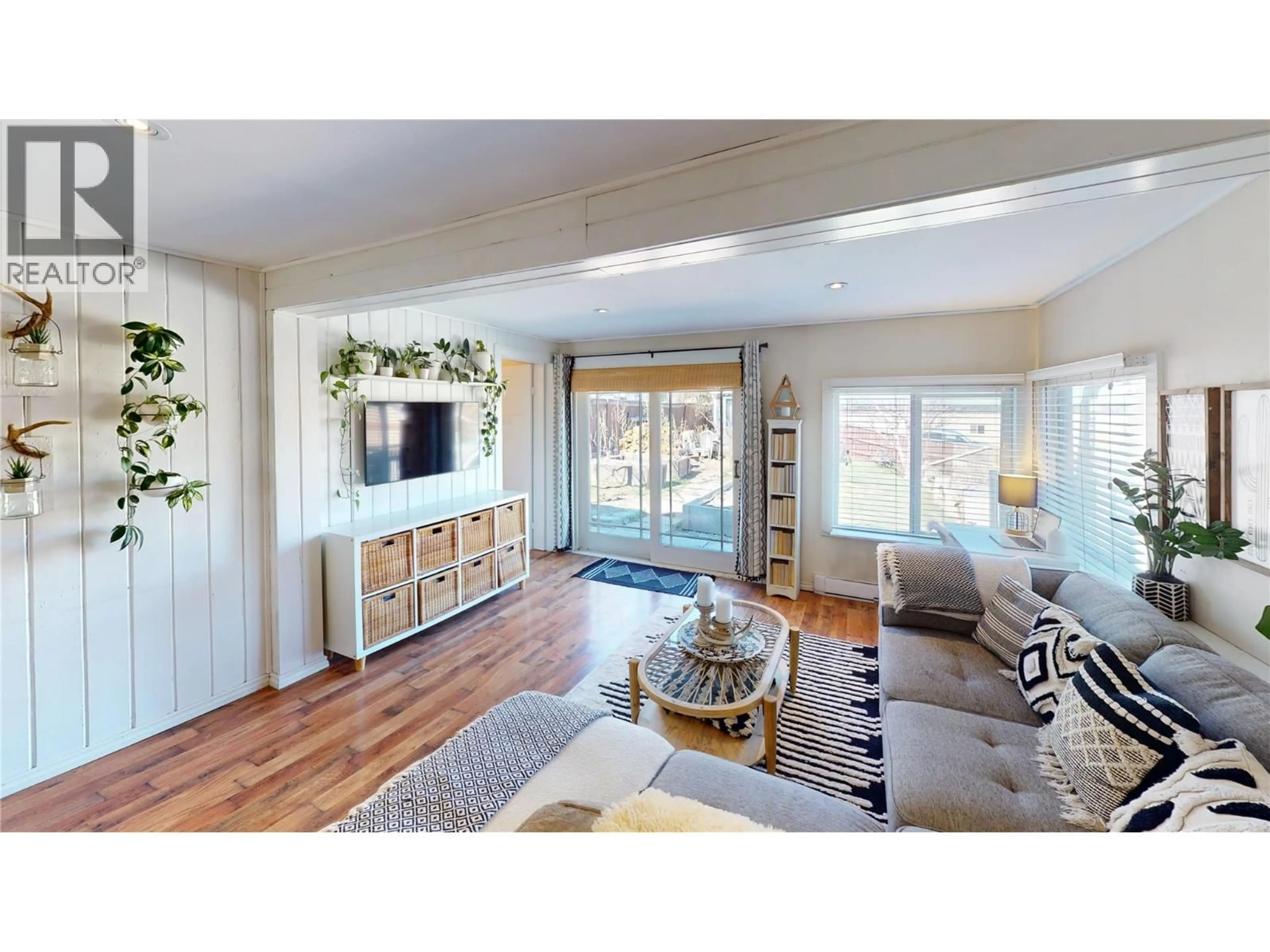 Living room with furniture, wood/laminate floor for 5728 VERMILLION STREET, Edgewater British Columbia V0A1E0