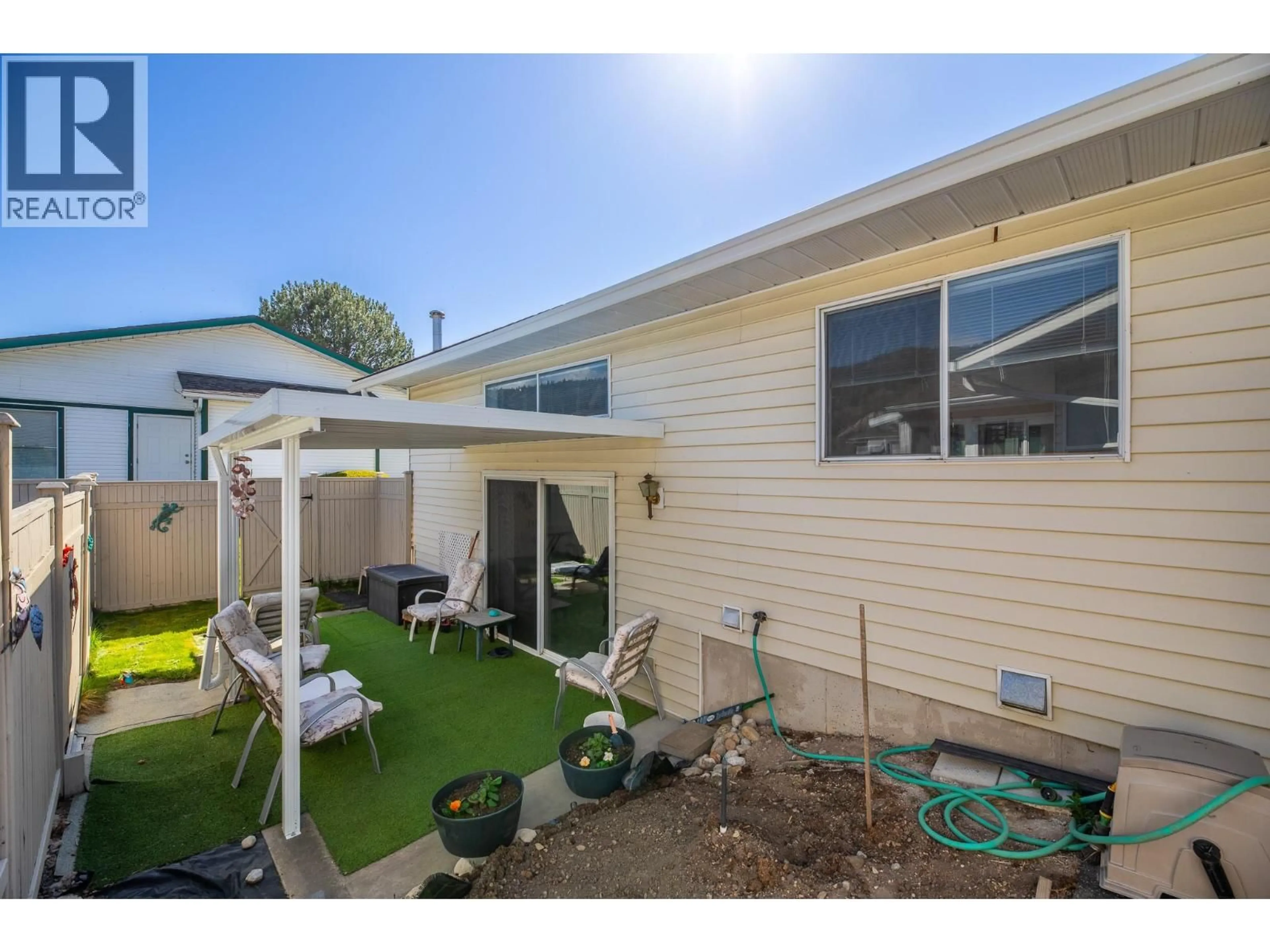 A pic from outside/outdoor area/front of a property/back of a property/a pic from drone, street for 155 - 3400 WILSON STREET, Penticton British Columbia V2A8H9