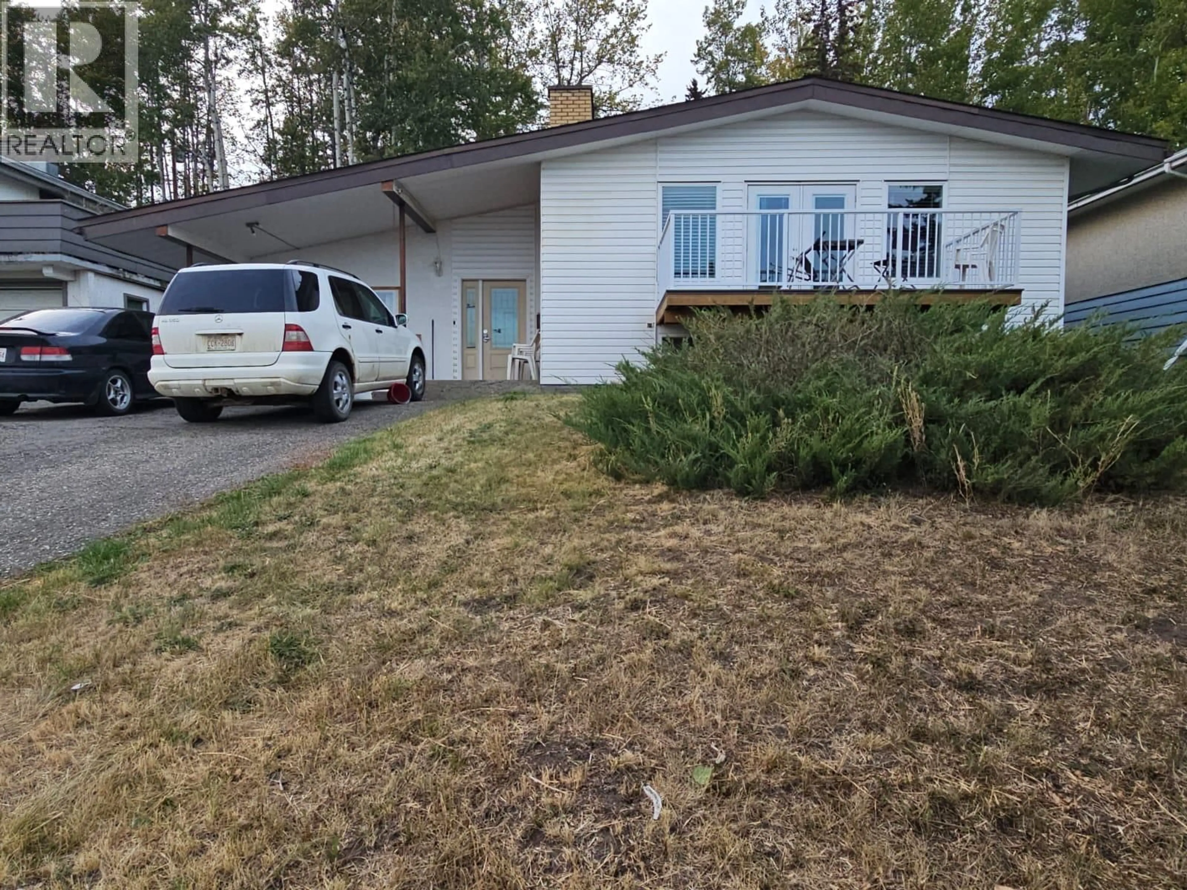 A pic from outside/outdoor area/front of a property/back of a property/a pic from drone, unknown for 5113 47 AVENUE NORTHWEST, Chetwynd British Columbia V0C1J0