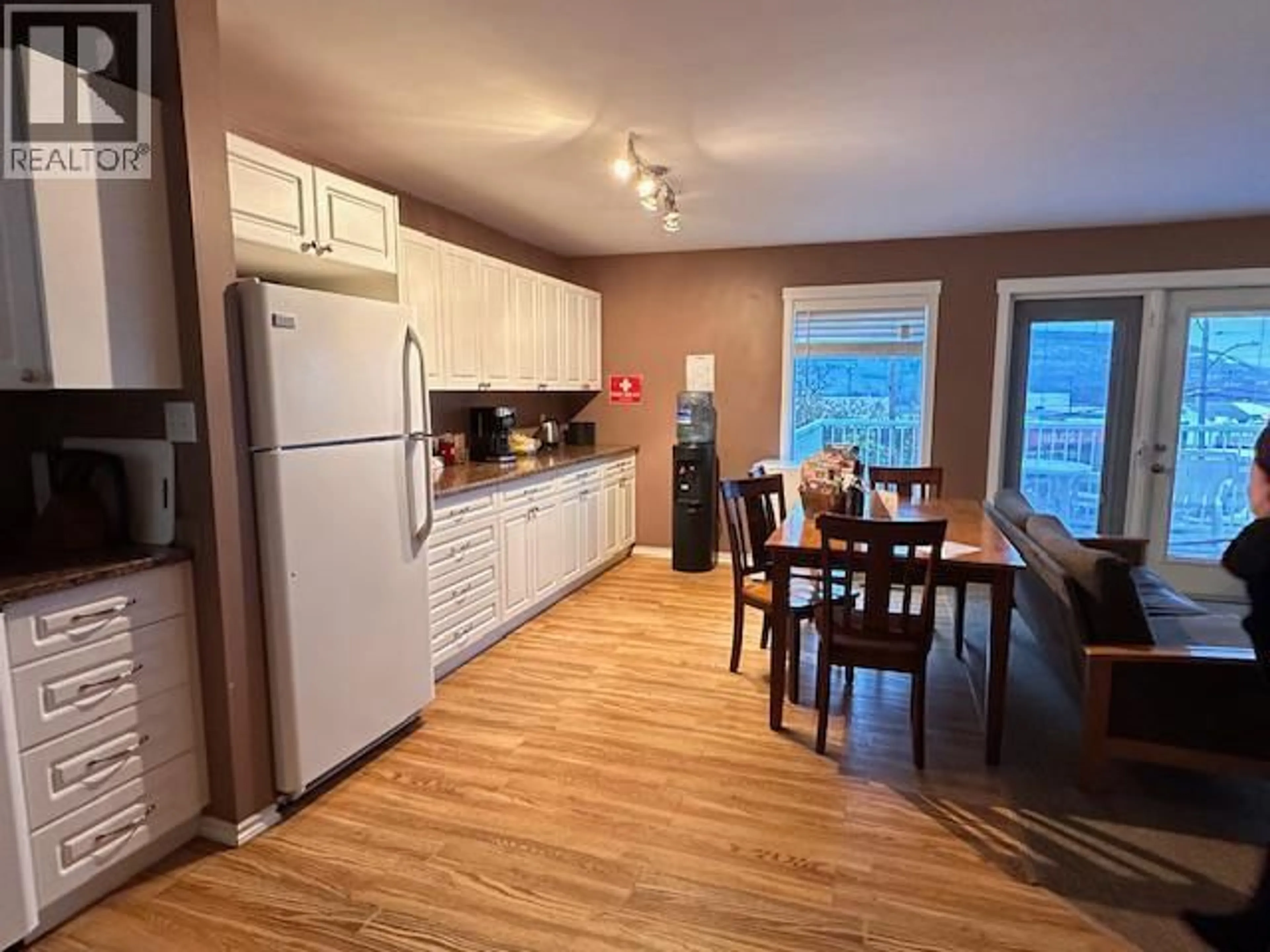 Open concept kitchen, wood/laminate floor for 5113 47 AVENUE NORTHWEST, Chetwynd British Columbia V0C1J0