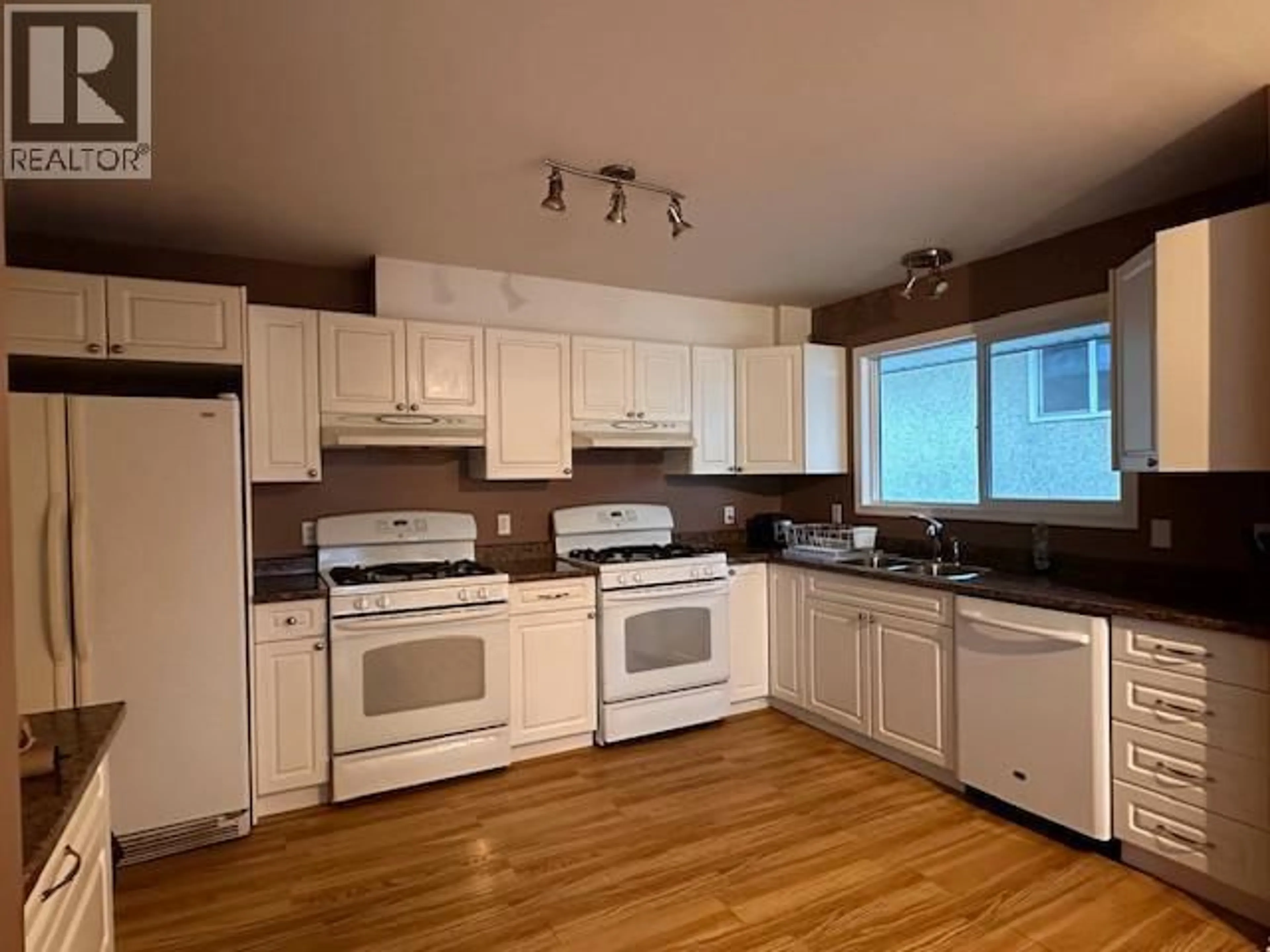 Standard kitchen, wood/laminate floor for 5113 47 AVENUE NORTHWEST, Chetwynd British Columbia V0C1J0