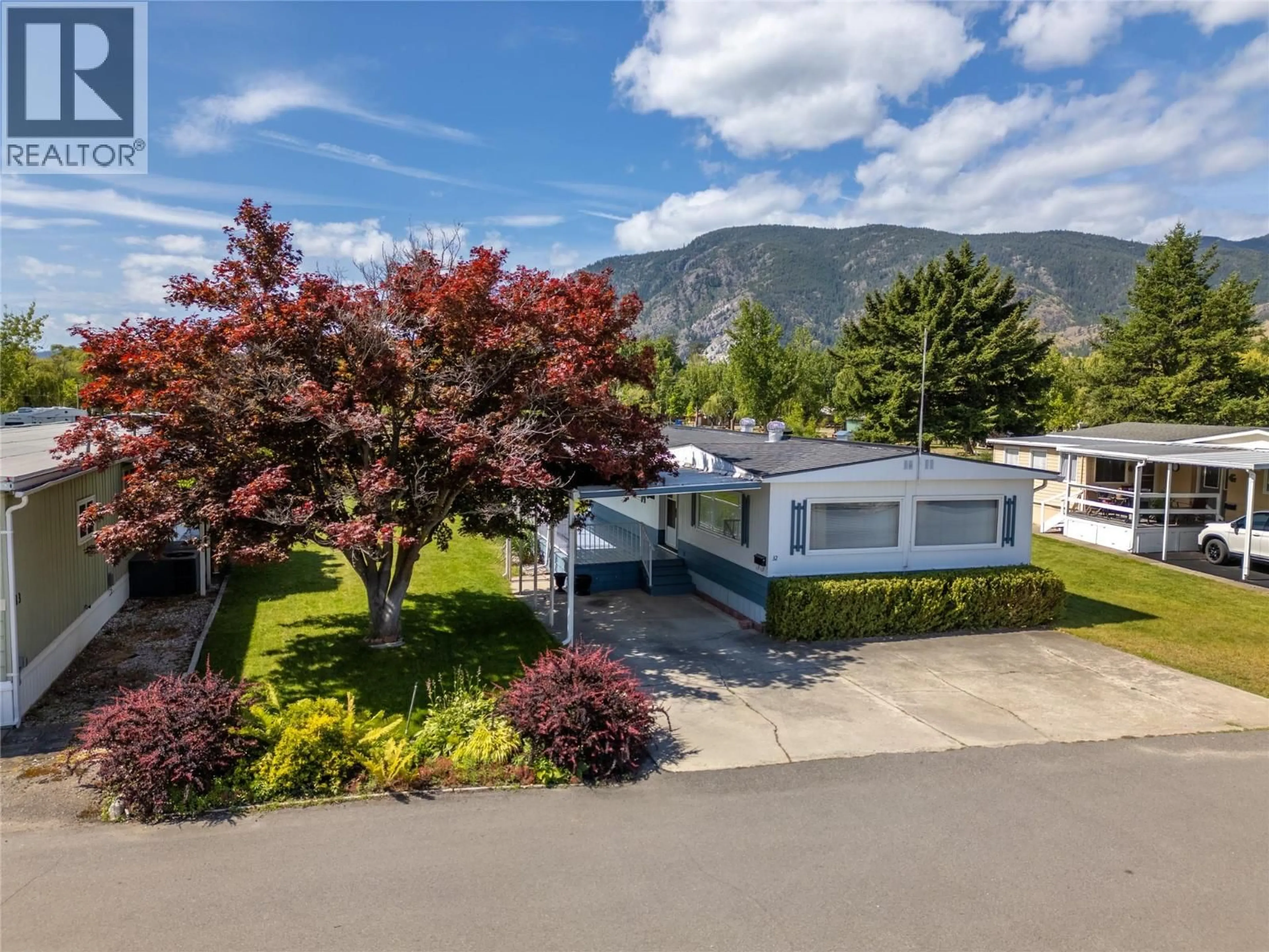 A pic from outside/outdoor area/front of a property/back of a property/a pic from drone, mountain view for 32 - 321 YORKTON AVENUE, Penticton British Columbia V2A3V6