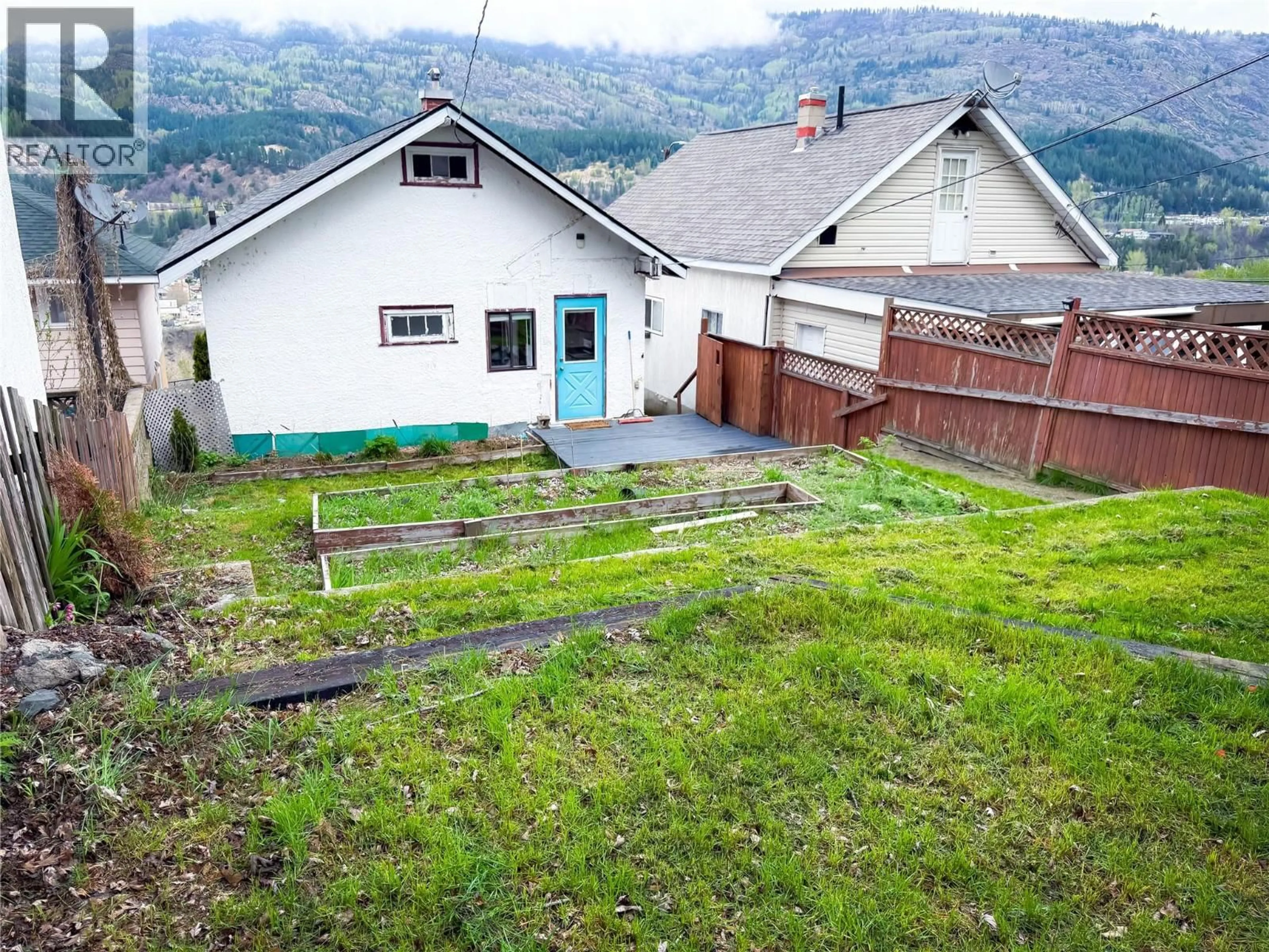 A pic from outside/outdoor area/front of a property/back of a property/a pic from drone, mountain view for 2224 TOPPING STREET, Trail British Columbia V1R4G5