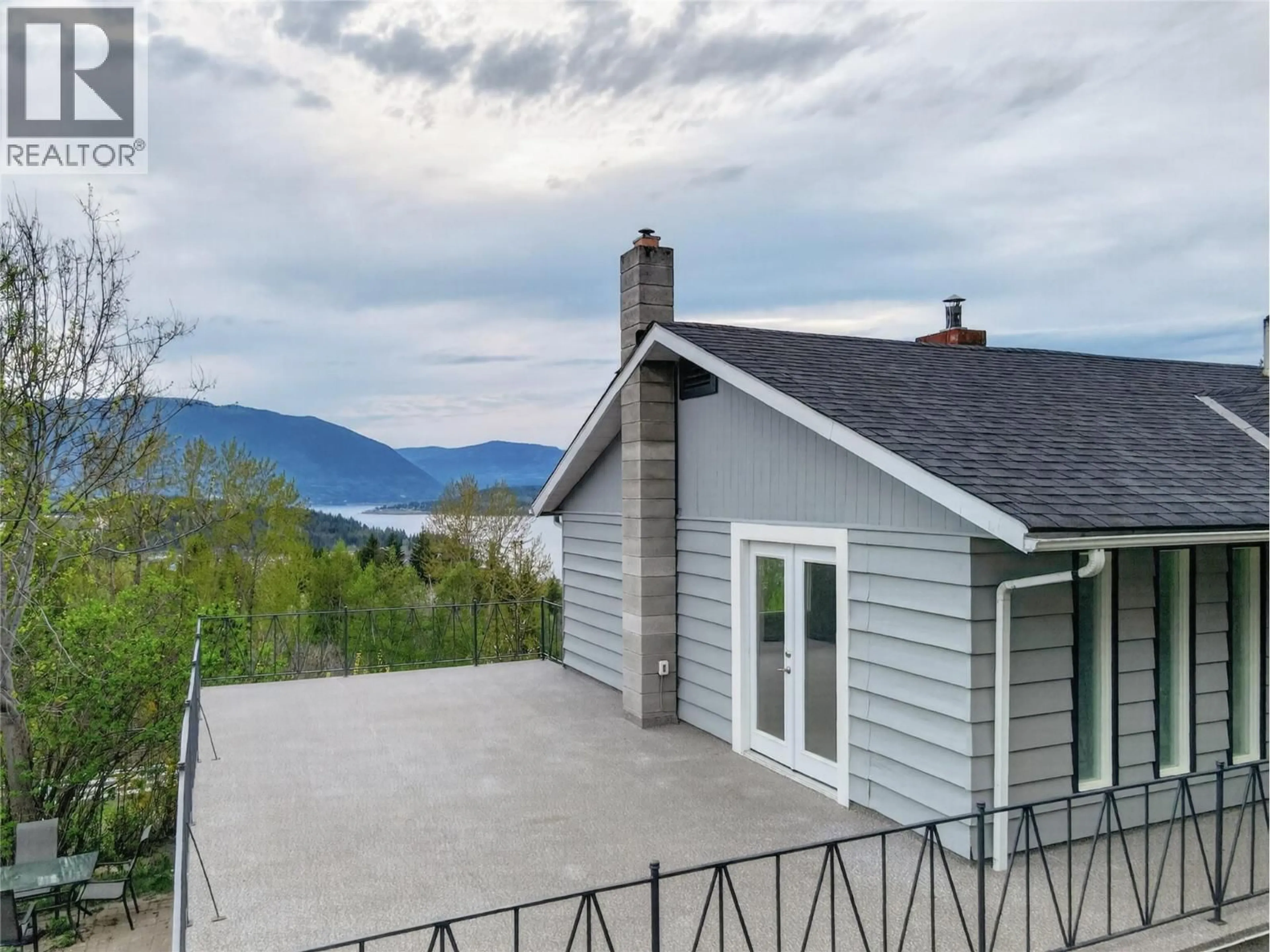 A pic from outside/outdoor area/front of a property/back of a property/a pic from drone, mountain view for 6990 70 AVENUE NORTHEAST, Salmon Arm British Columbia V0E1K0