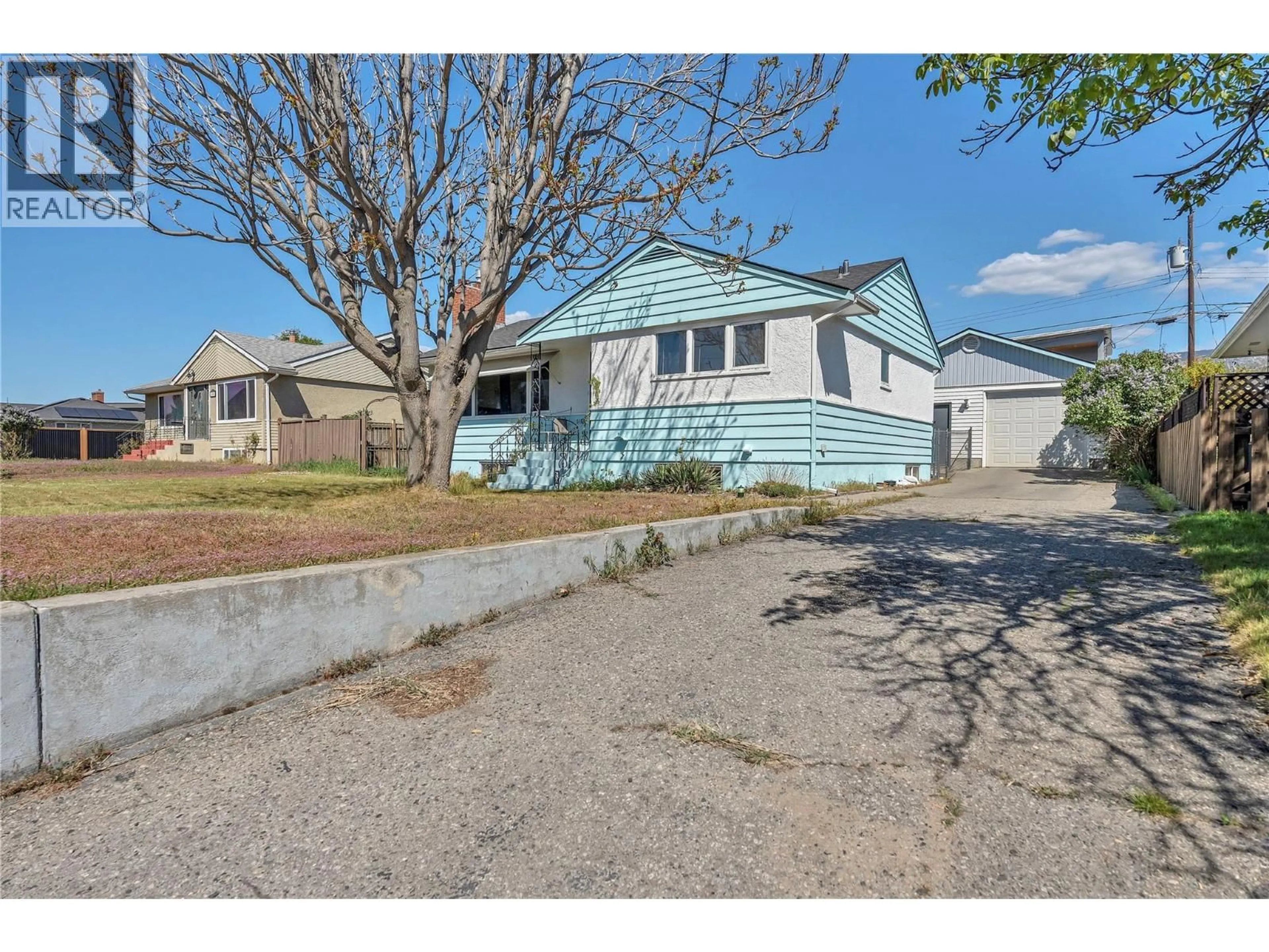 A pic from outside/outdoor area/front of a property/back of a property/a pic from drone, street for 1412 MANITOBA STREET, Penticton British Columbia V2A5A2
