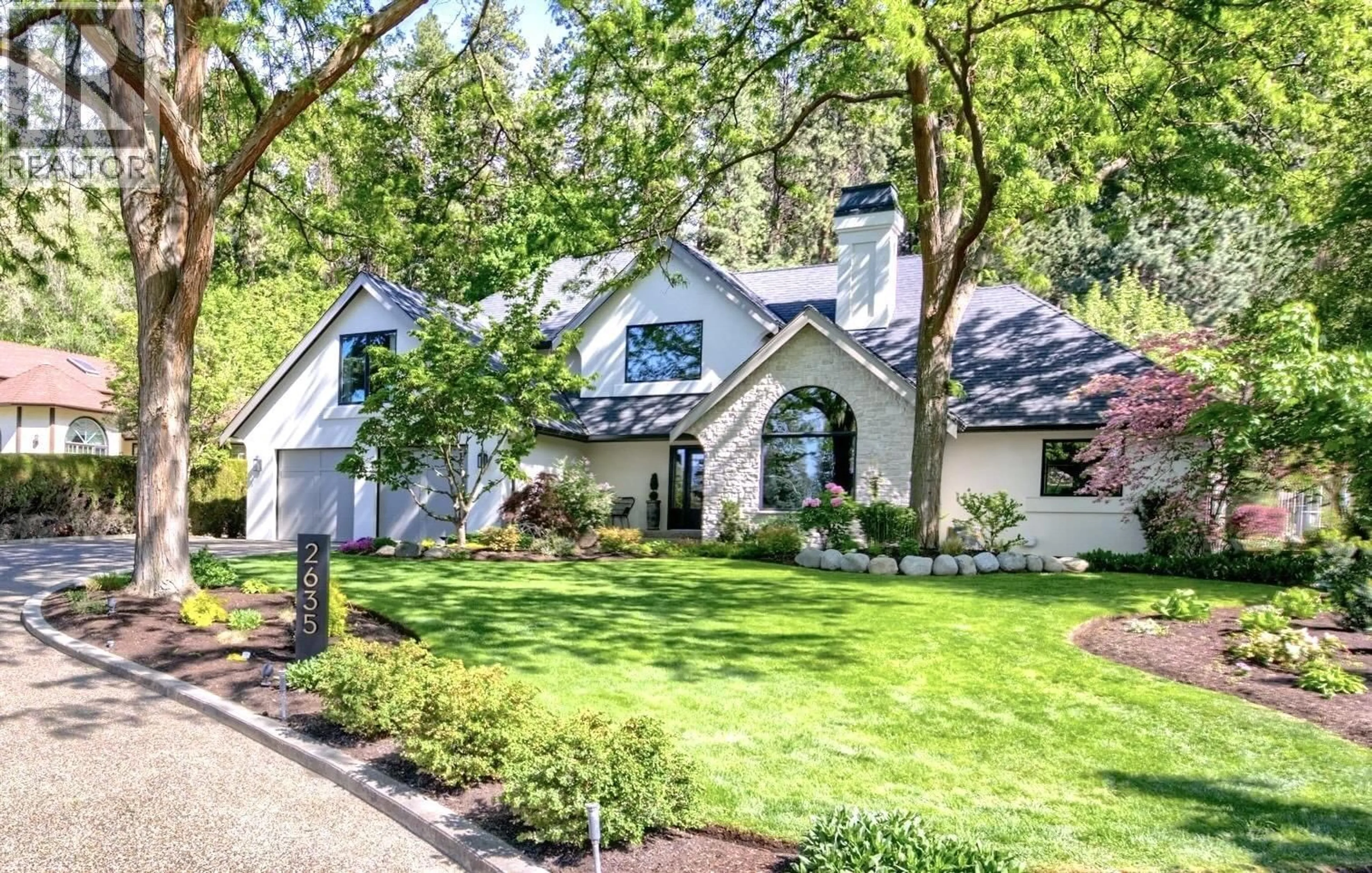 Home with vinyl exterior material, street for 2635 O'REILLY ROAD, Kelowna British Columbia V1W2X9