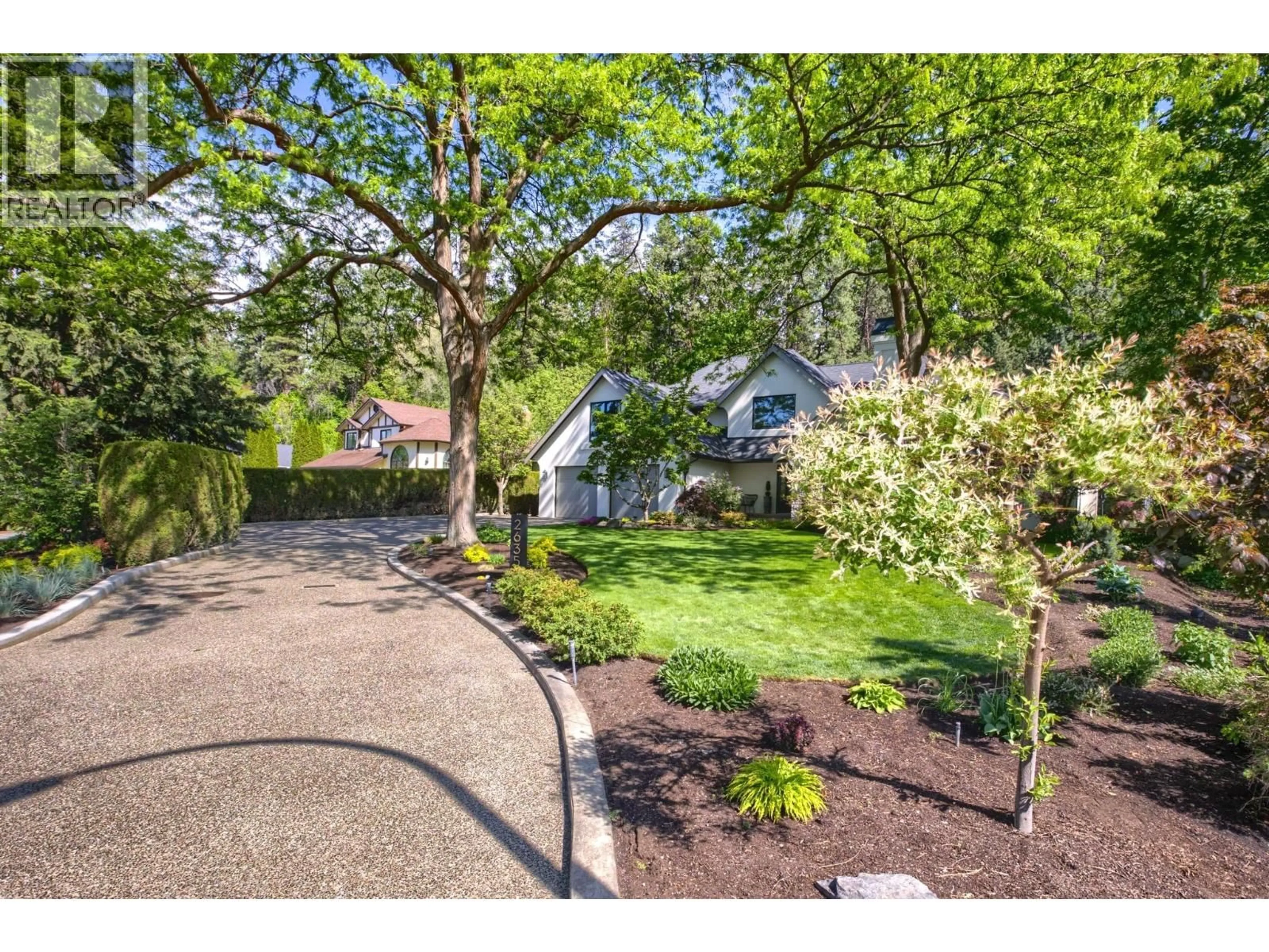 A pic from outside/outdoor area/front of a property/back of a property/a pic from drone, street for 2635 O'REILLY ROAD, Kelowna British Columbia V1W2X9