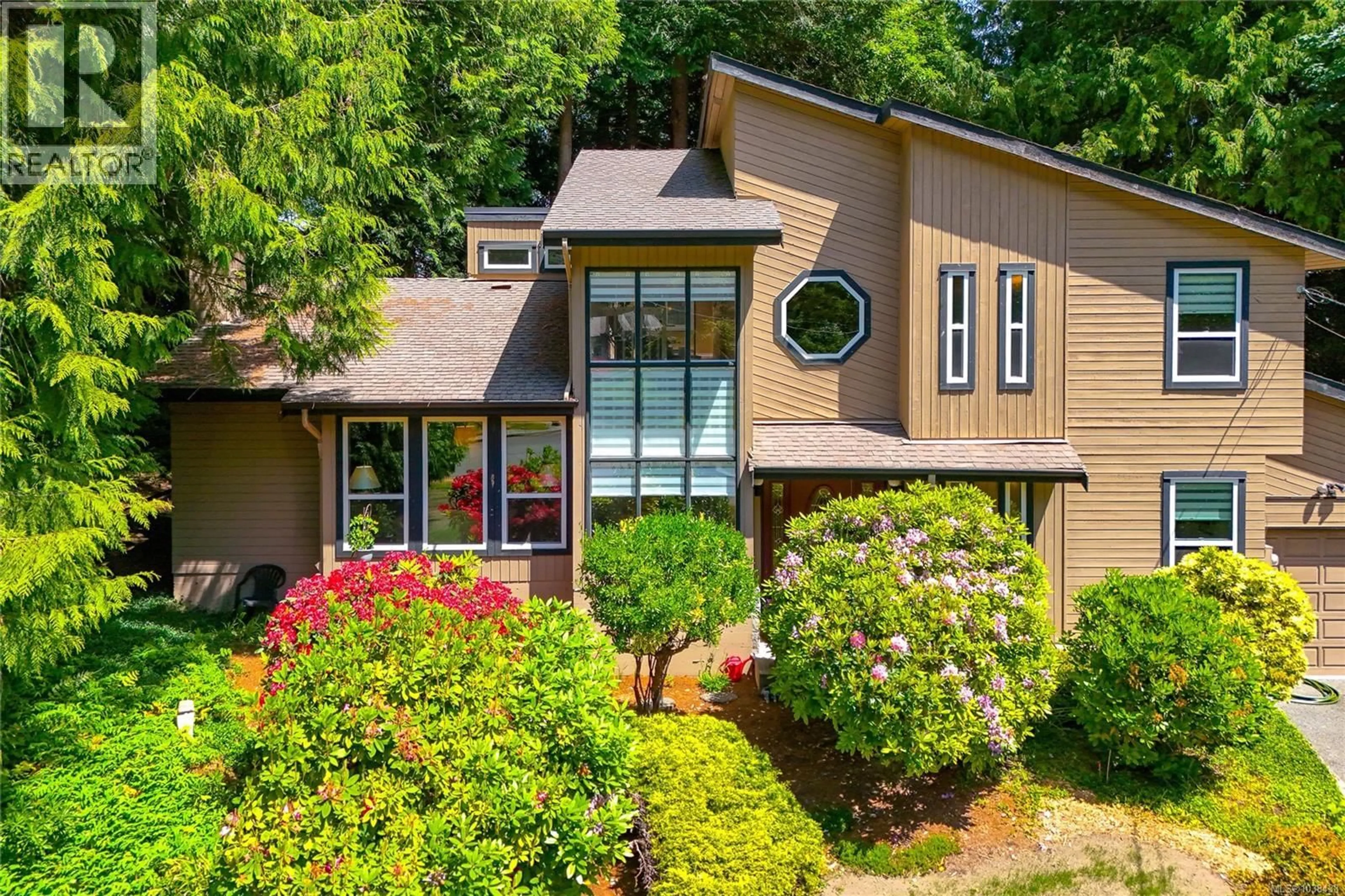 Home with brick exterior material, unknown for 8705 NASH PLACE, North Saanich British Columbia V8L4G9