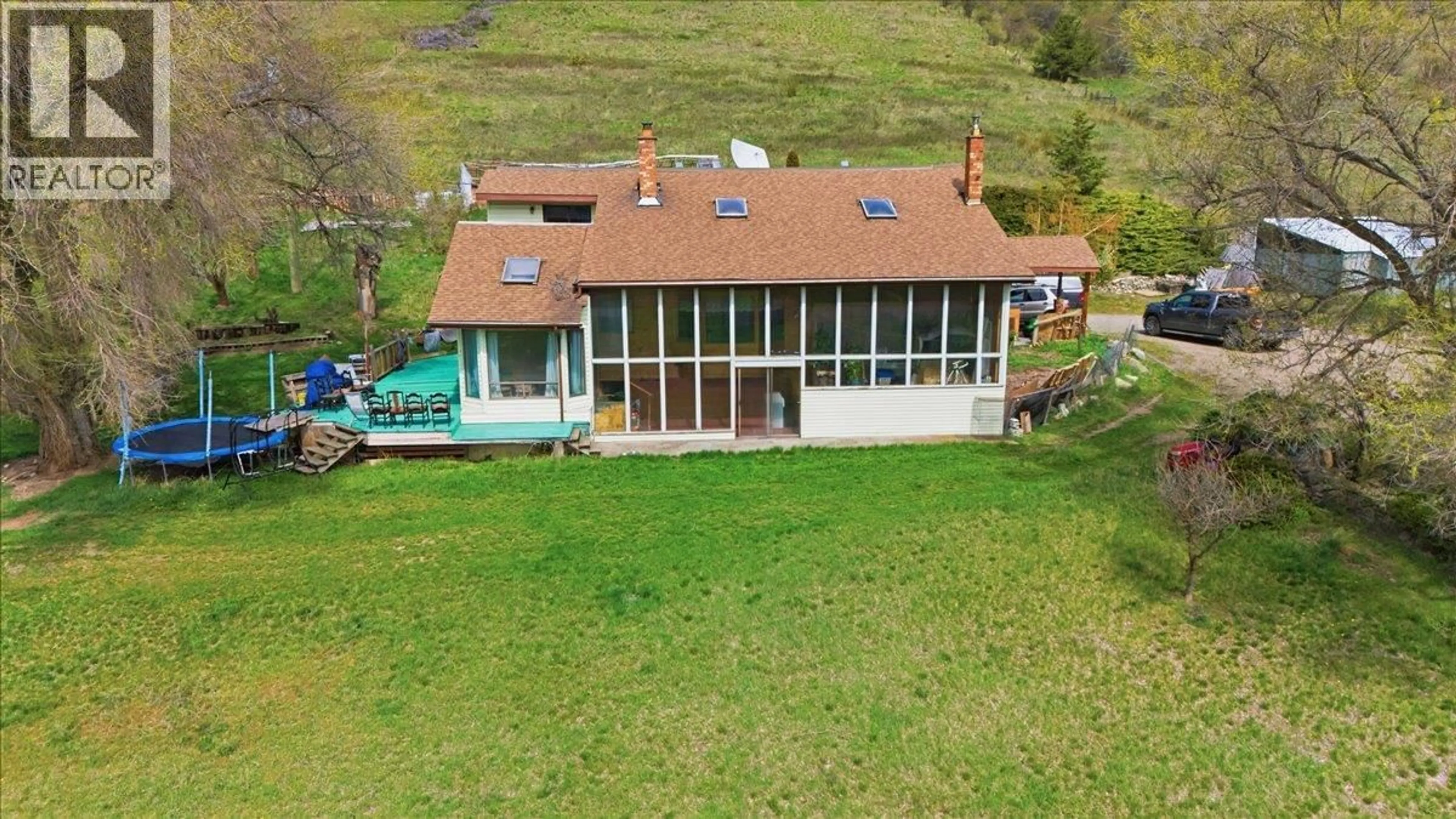 A pic from outside/outdoor area/front of a property/back of a property/a pic from drone, building for 8163 BUCHANAN ROAD, Coldstream British Columbia V1B3B8