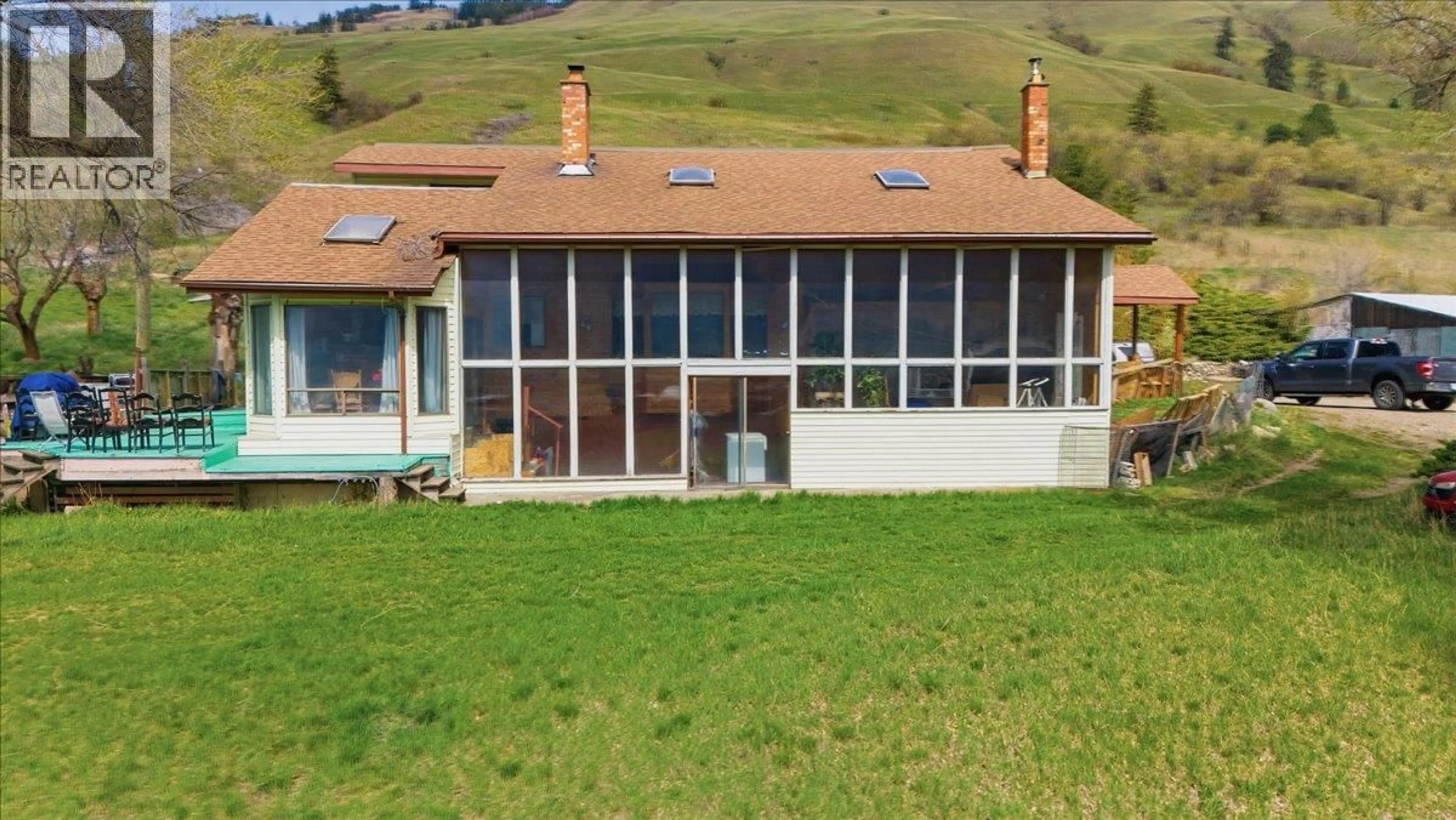 A pic from outside/outdoor area/front of a property/back of a property/a pic from drone, building for 8163 BUCHANAN ROAD, Coldstream British Columbia V1B3B8