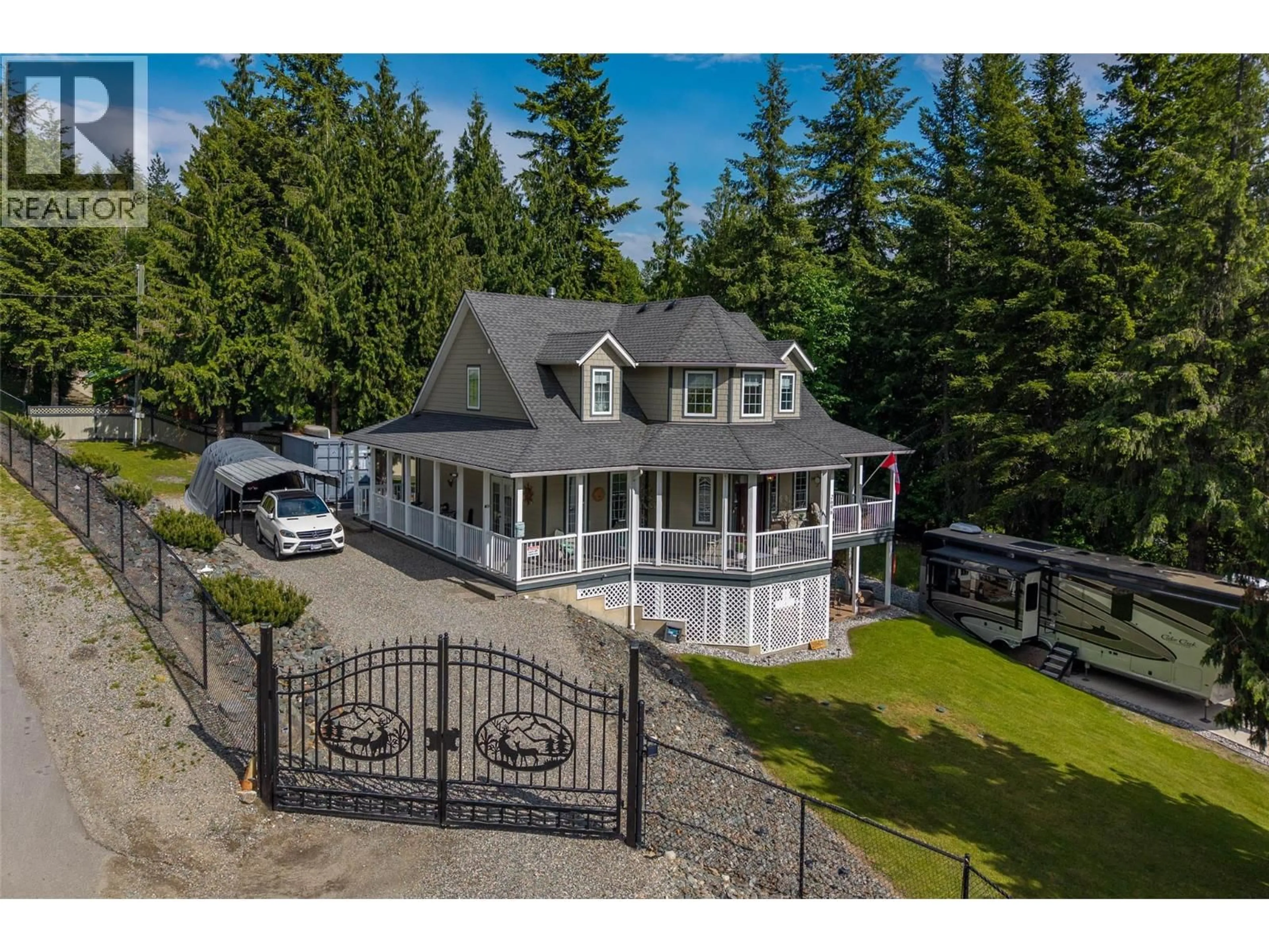 A pic from outside/outdoor area/front of a property/back of a property/a pic from drone, water/lake/river/ocean view for 2696 FRASER ROAD, Anglemont British Columbia V0E1M8