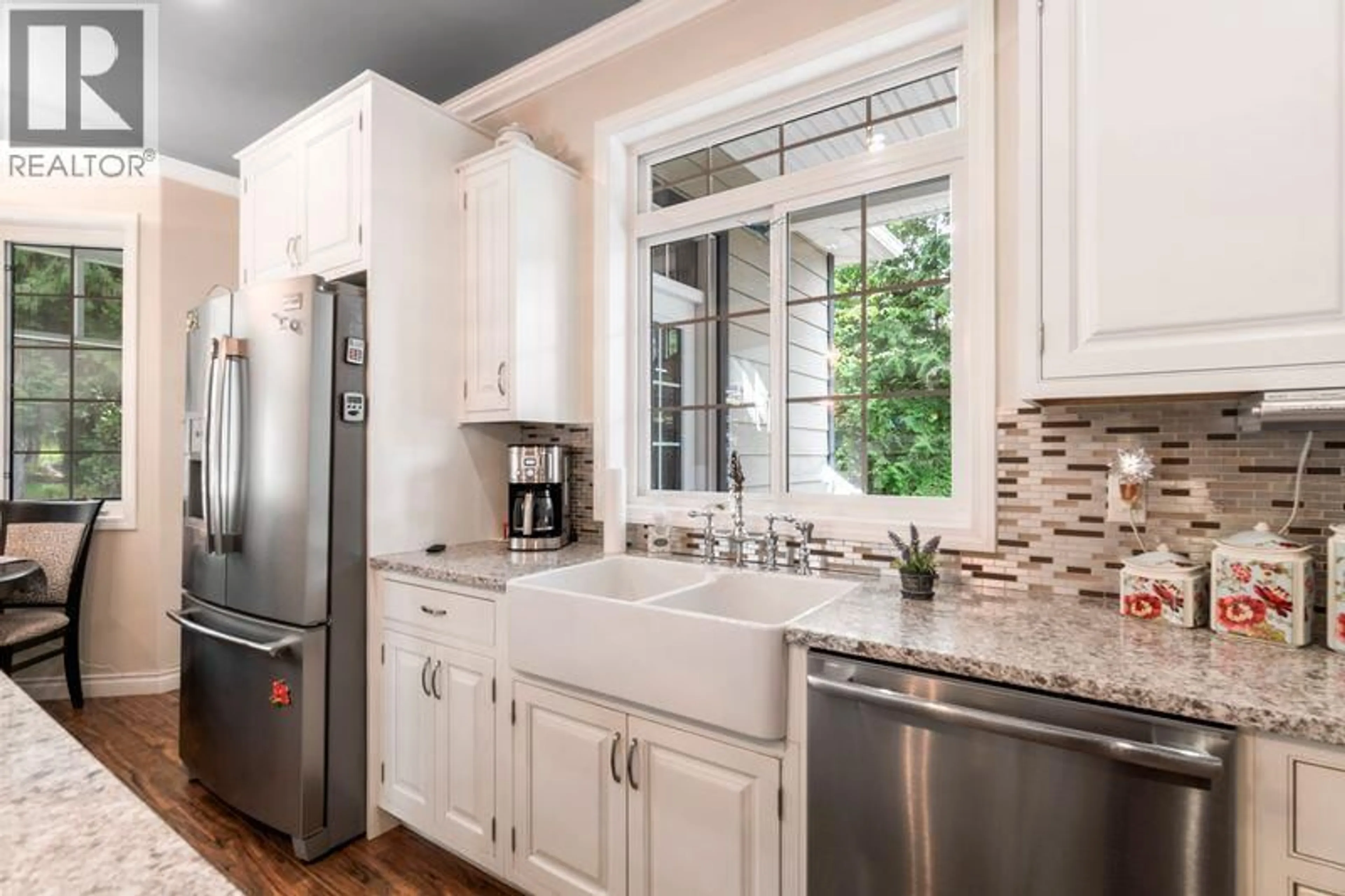 Contemporary kitchen, ceramic/tile floor for 2696 FRASER ROAD, Anglemont British Columbia V0E1M8