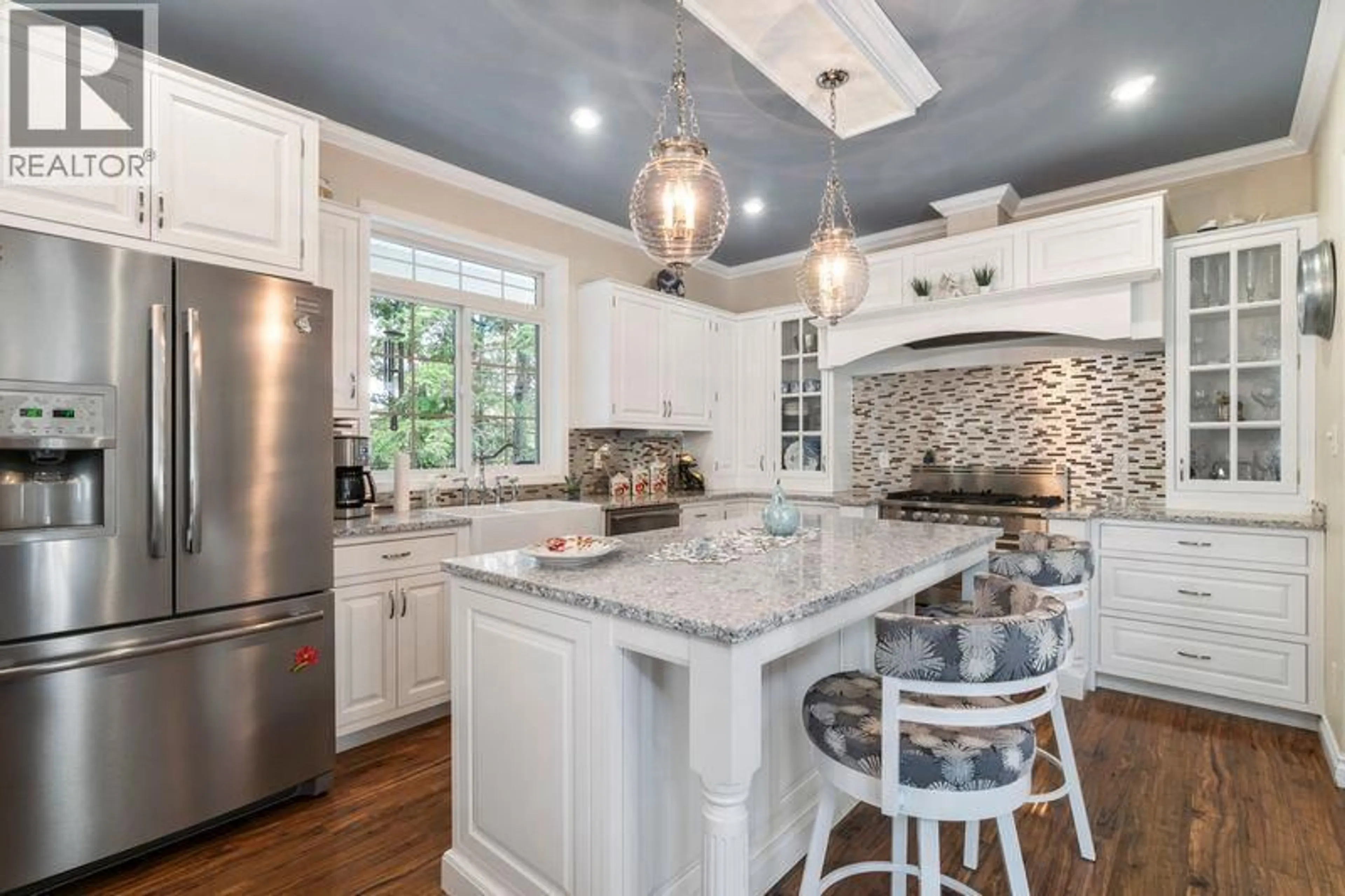 Open concept kitchen, ceramic/tile floor for 2696 FRASER ROAD, Anglemont British Columbia V0E1M8
