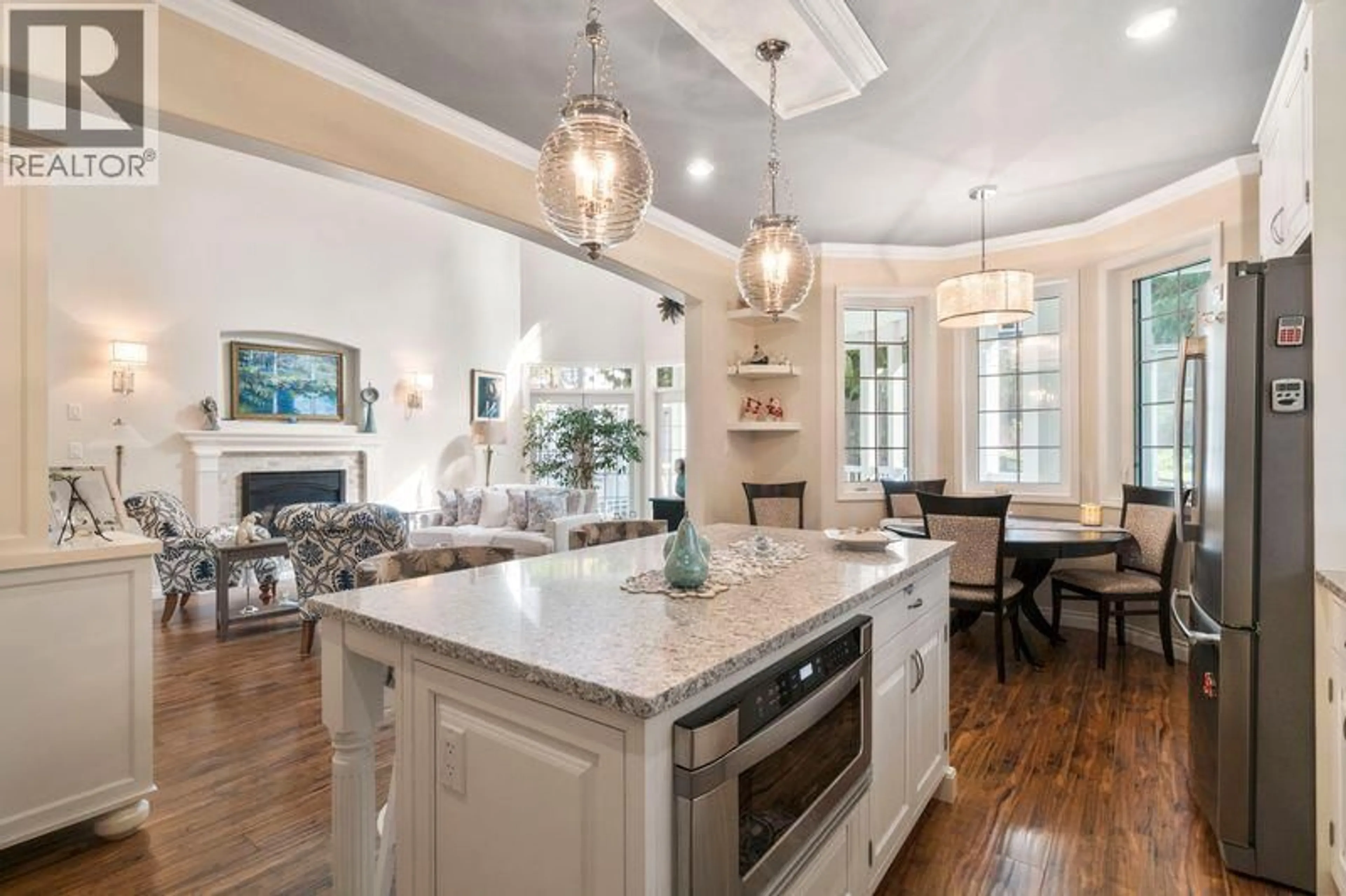 Open concept kitchen, ceramic/tile floor for 2696 FRASER ROAD, Anglemont British Columbia V0E1M8