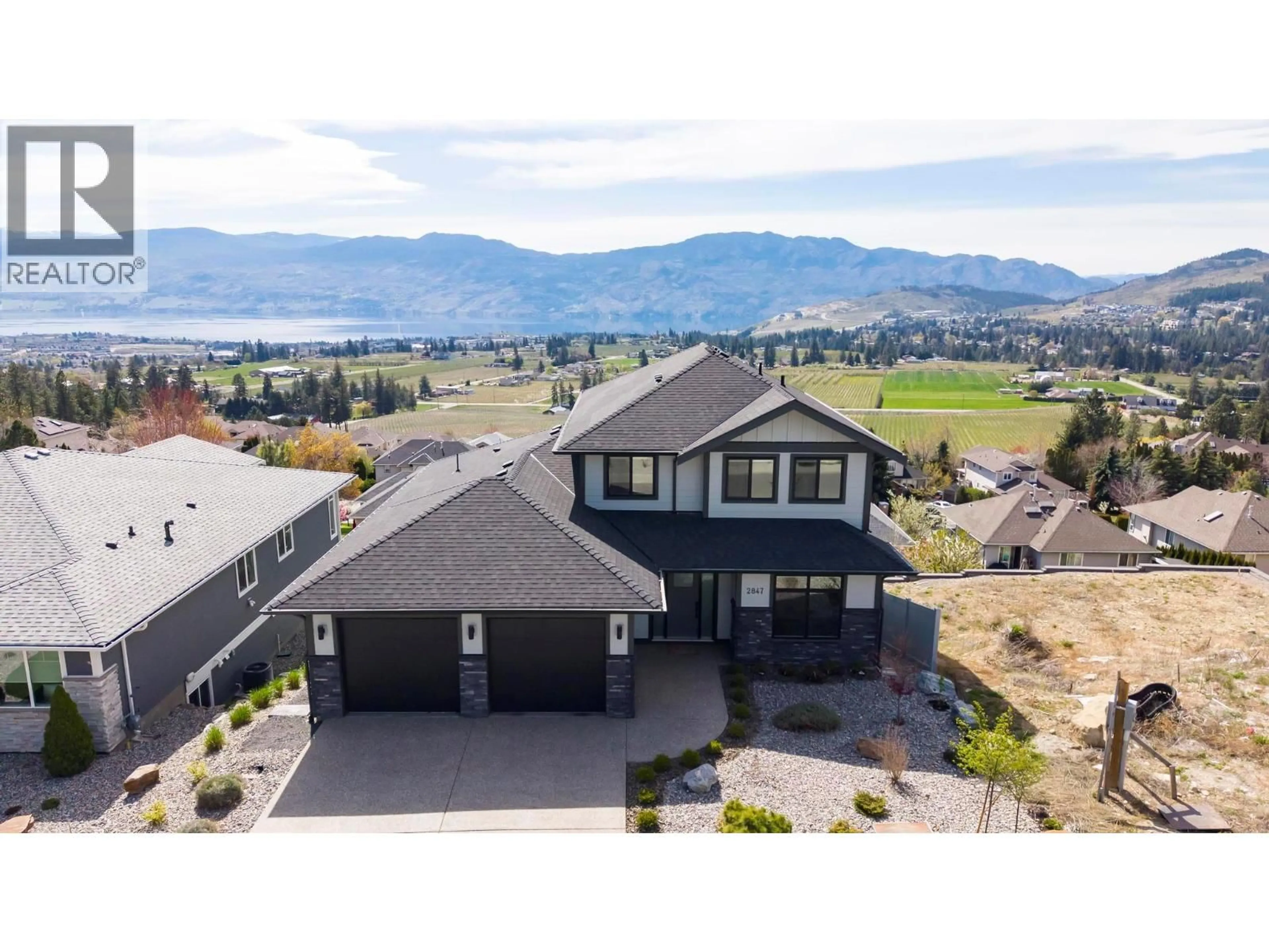 A pic from outside/outdoor area/front of a property/back of a property/a pic from drone, mountain view for 2847 COPPER RIDGE DRIVE, West Kelowna British Columbia V4T0E7
