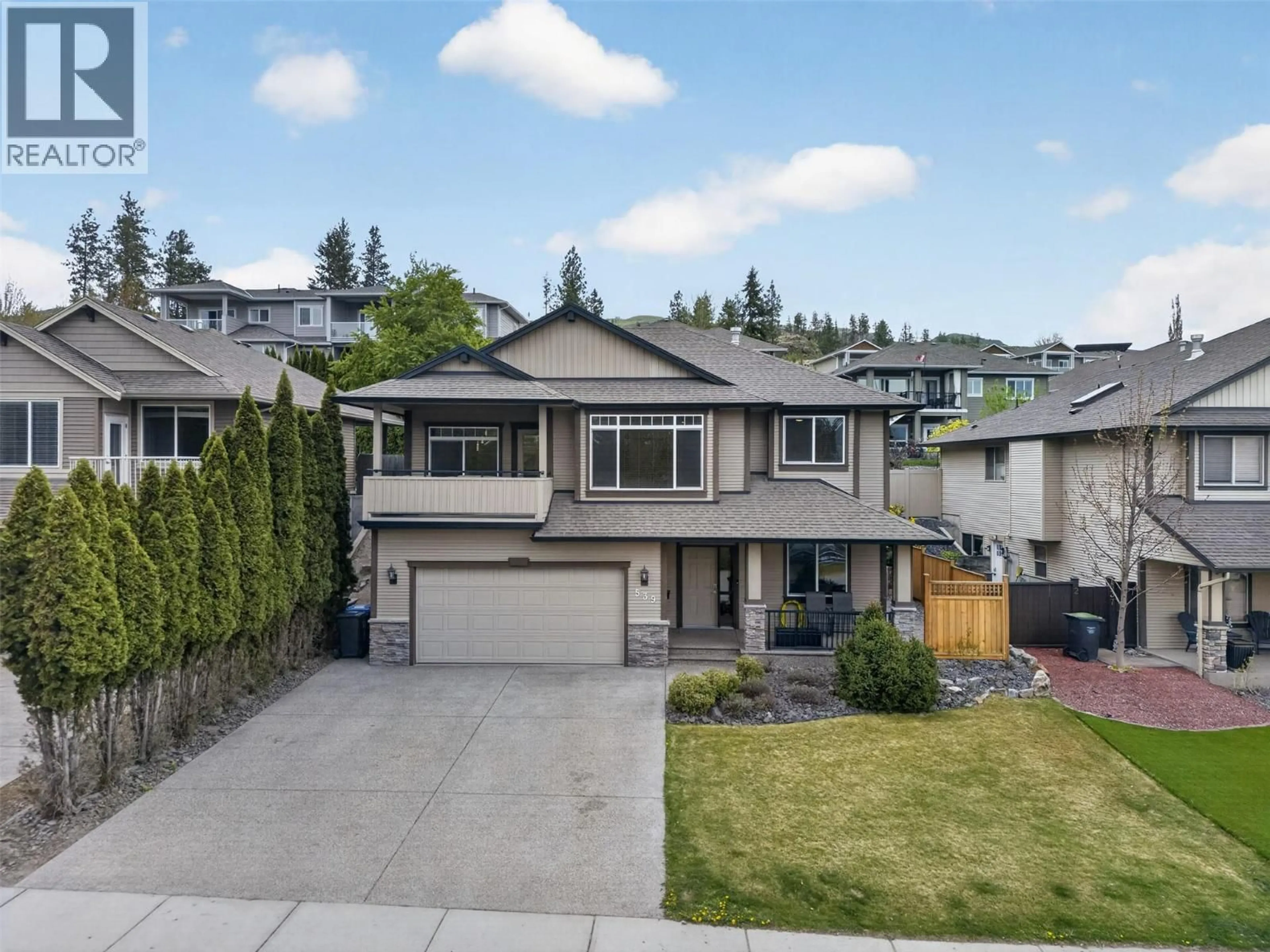 A pic from outside/outdoor area/front of a property/back of a property/a pic from drone, street for 539 SOUTH CREST DRIVE, Kelowna British Columbia V1W4W8