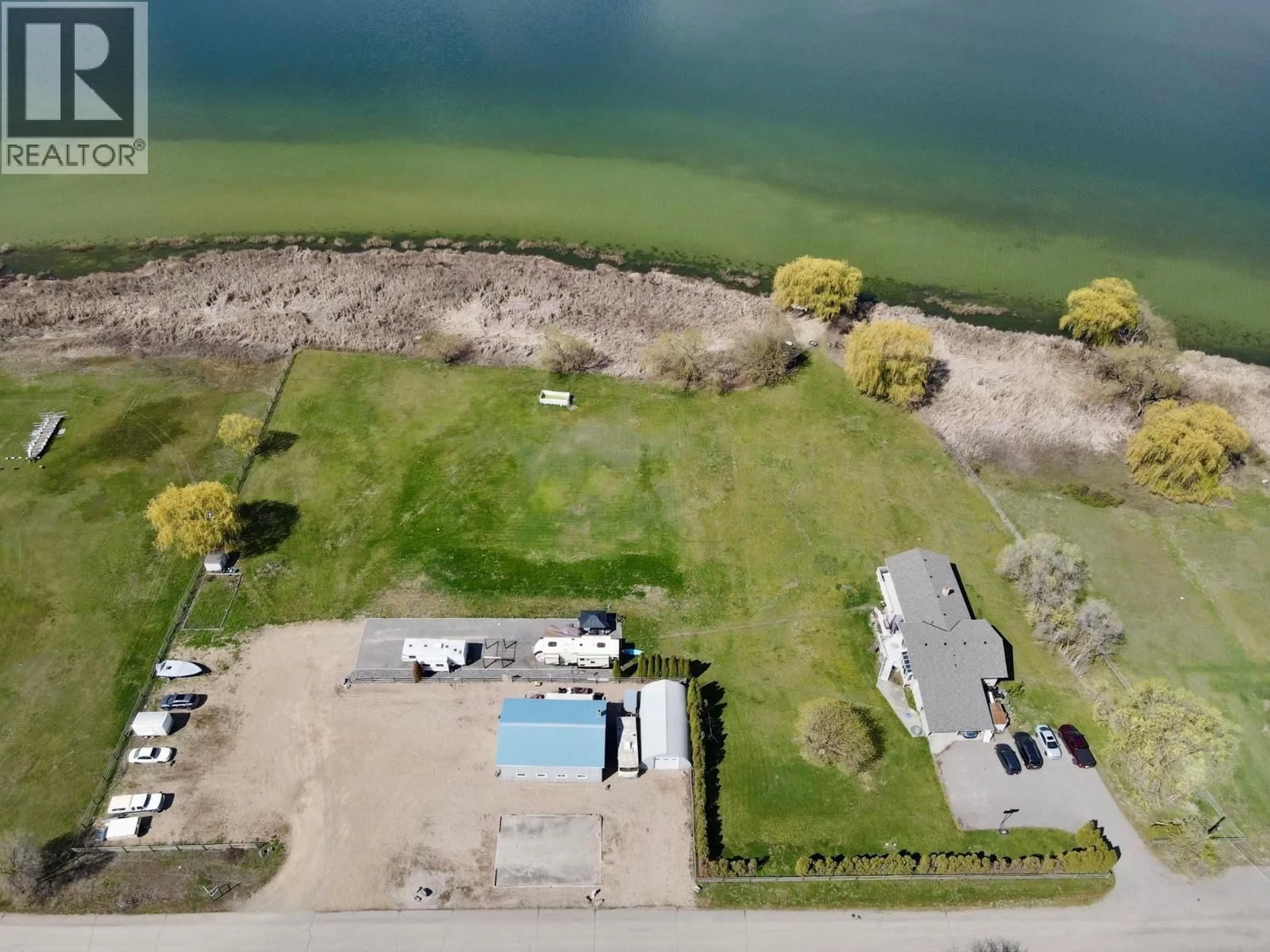A pic from outside/outdoor area/front of a property/back of a property/a pic from drone, water/lake/river/ocean view for 7792 LOCHDALE ROAD, Vernon British Columbia V1B3R8