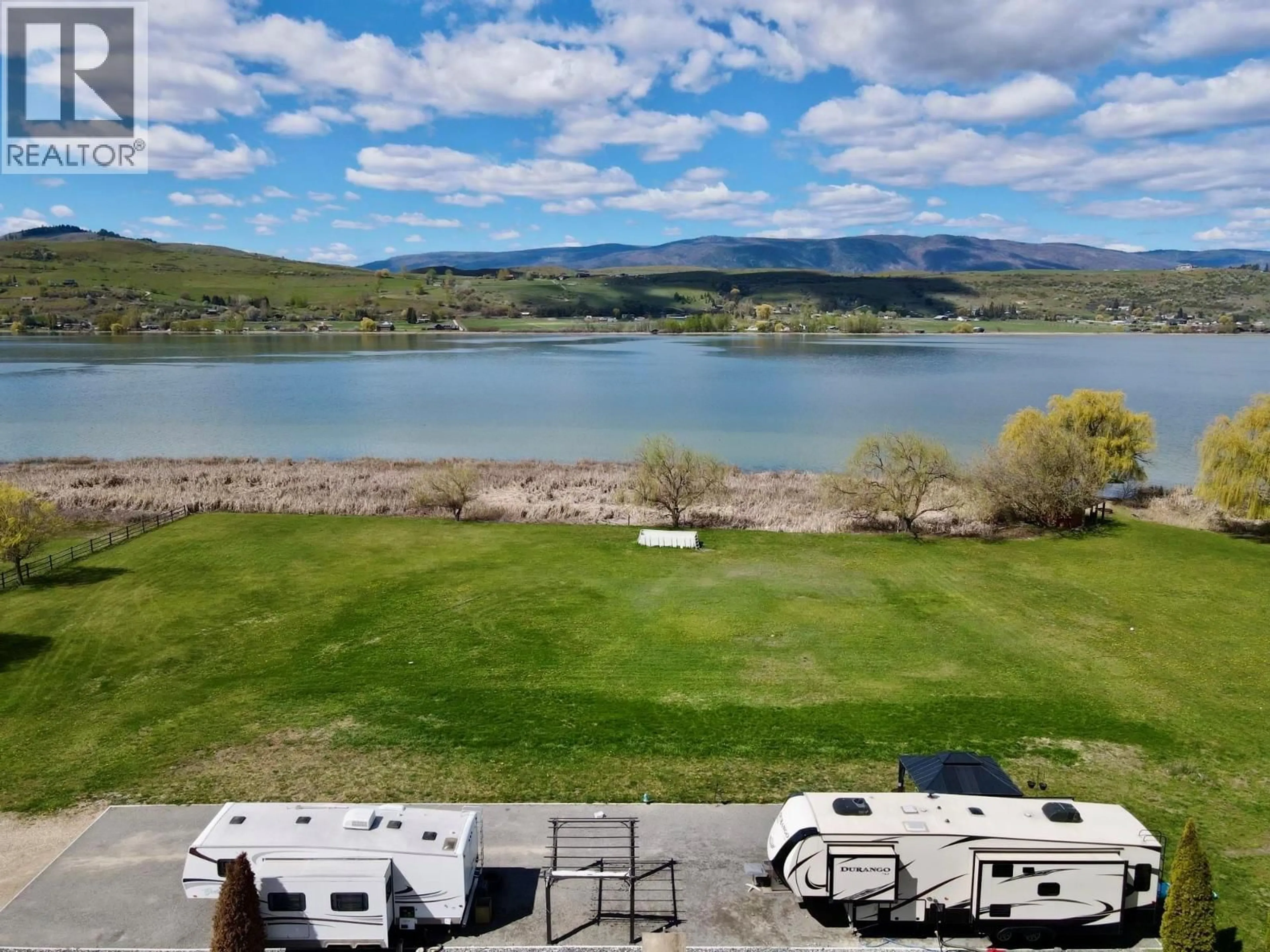 A pic from outside/outdoor area/front of a property/back of a property/a pic from drone, water/lake/river/ocean view for 7792 LOCHDALE ROAD, Vernon British Columbia V1B3R8