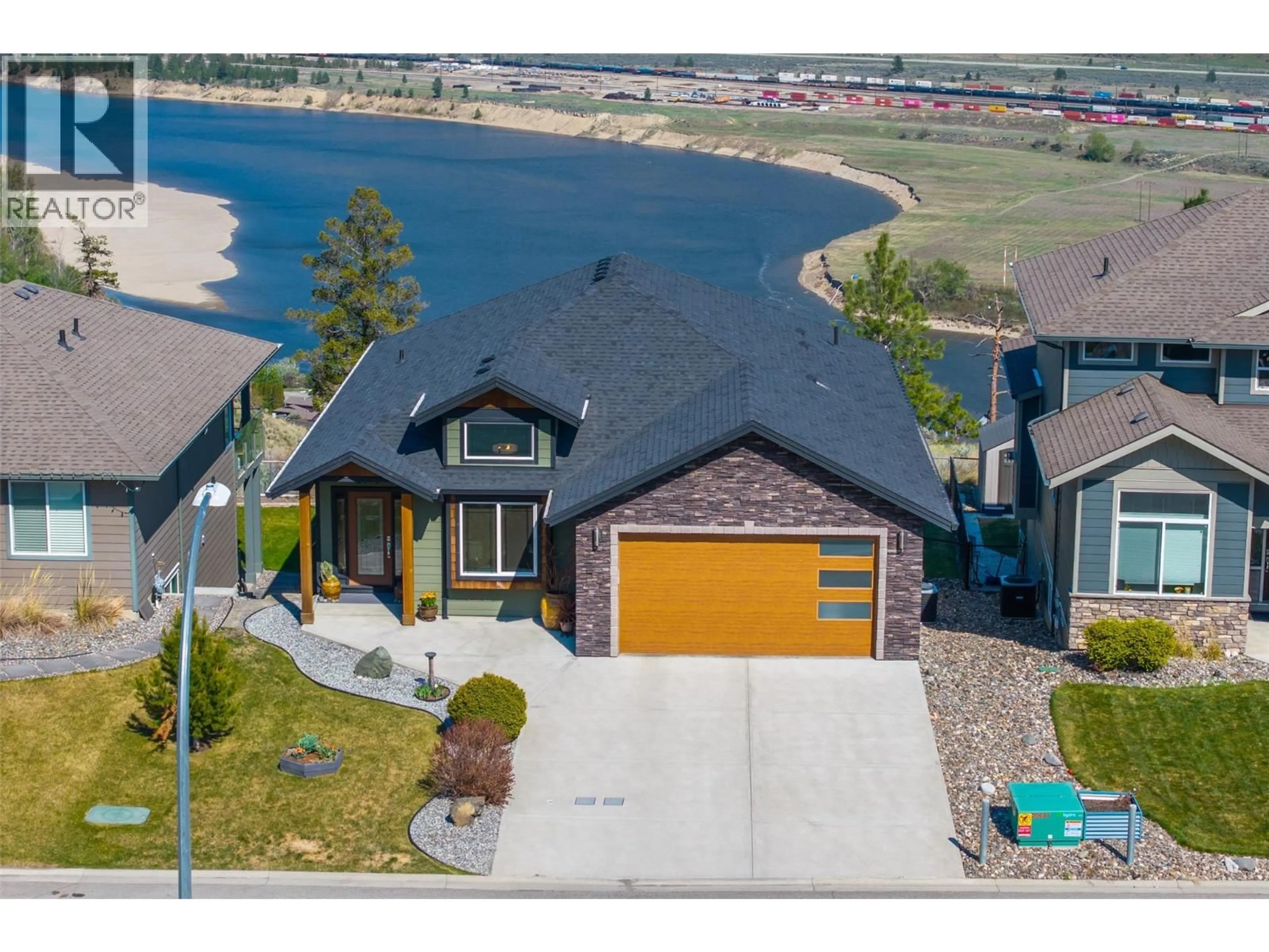 A pic from outside/outdoor area/front of a property/back of a property/a pic from drone, water/lake/river/ocean view for 2190 DOUBLETREE CRESCENT, Kamloops British Columbia V2B0G8