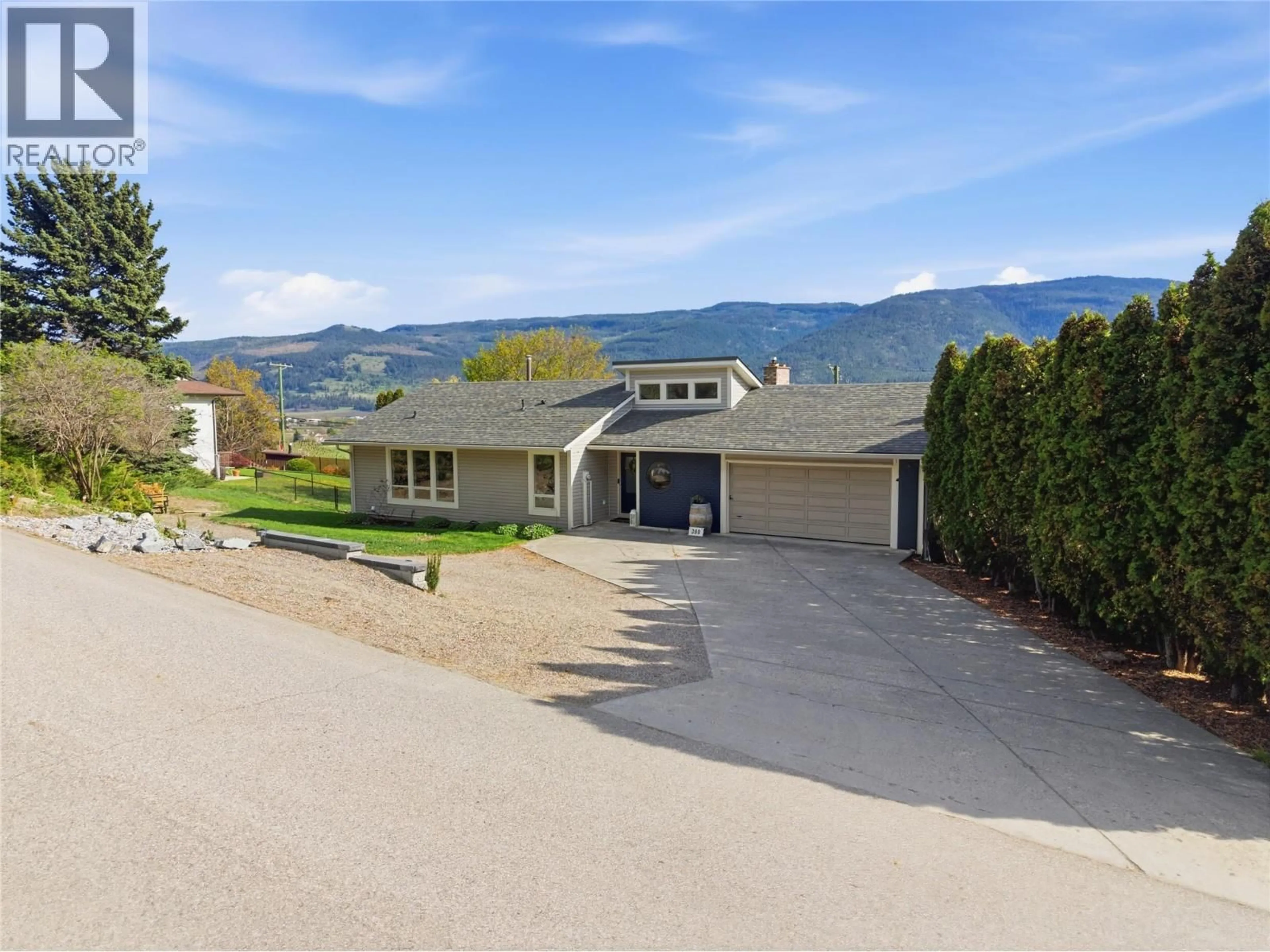 A pic from outside/outdoor area/front of a property/back of a property/a pic from drone, mountain view for 300 SCENIC DRIVE, Coldstream British Columbia V1B2X3