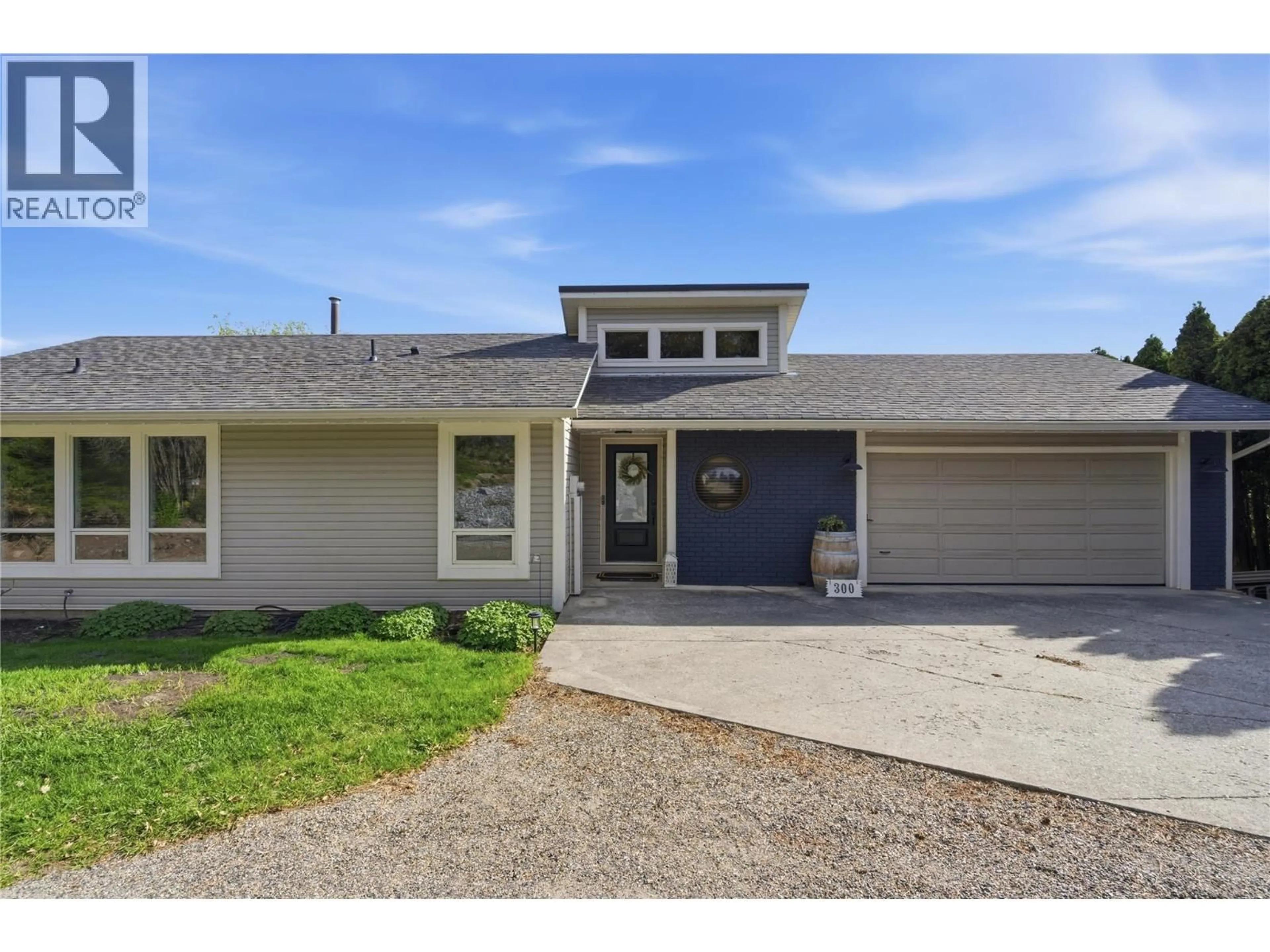 Home with vinyl exterior material, street for 300 SCENIC DRIVE, Coldstream British Columbia V1B2X3