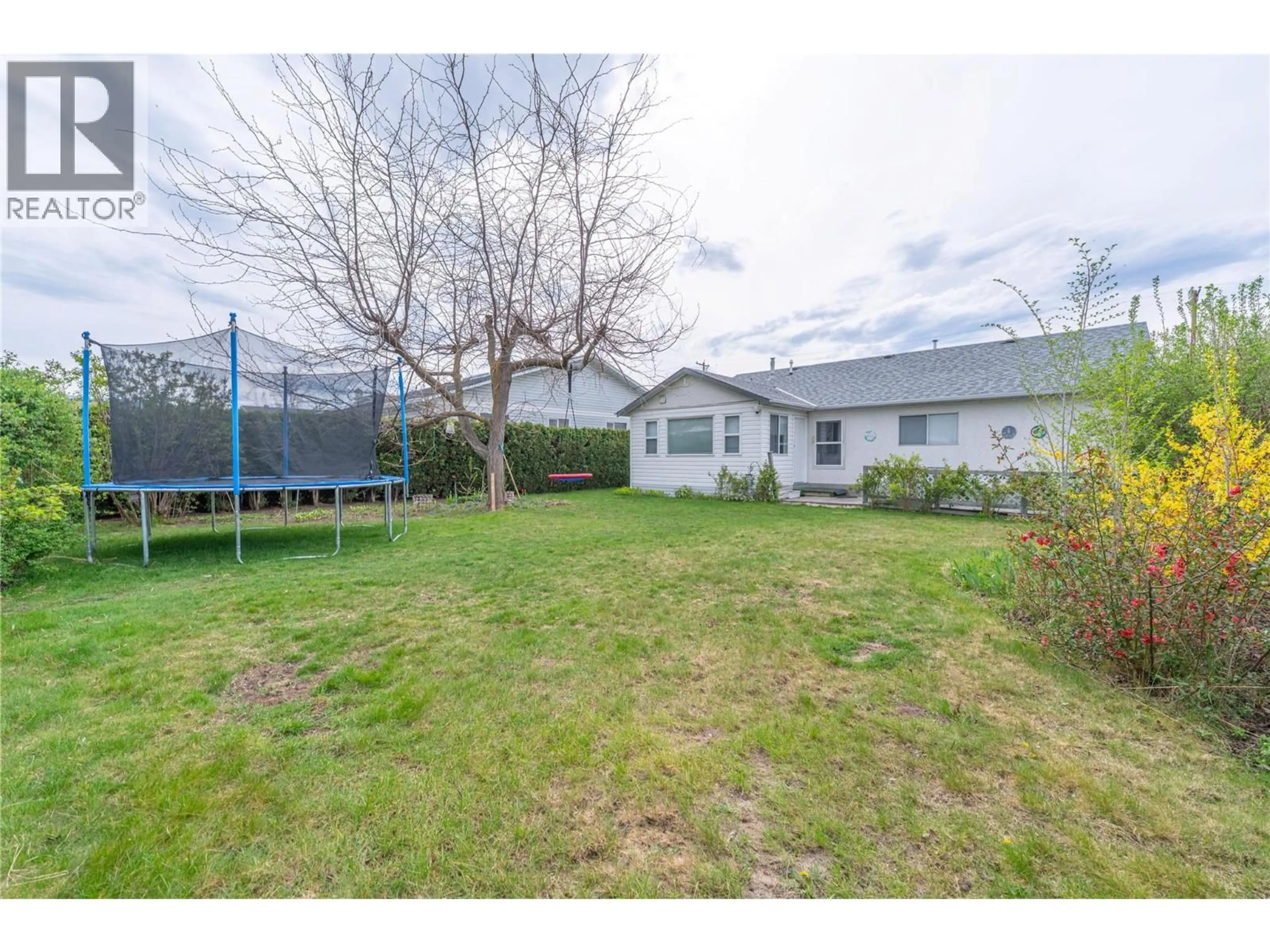 A pic from outside/outdoor area/front of a property/back of a property/a pic from drone, street for 151 MOLNAR ROAD, Kelowna British Columbia V1X7B5