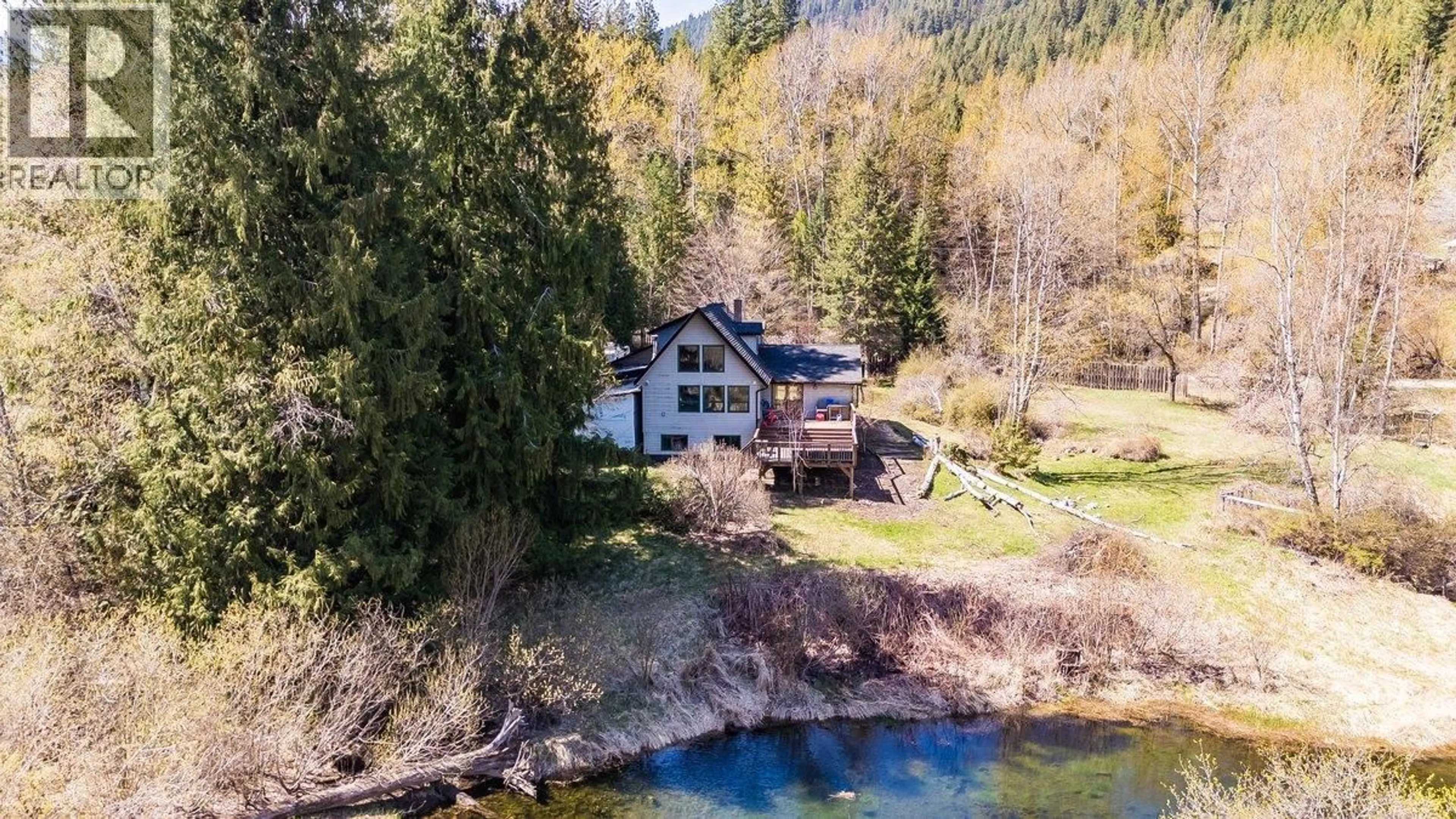 A pic from outside/outdoor area/front of a property/back of a property/a pic from drone, water/lake/river/ocean view for 4408 SLOCAN  RIVER ROAD, Winlaw British Columbia V0G2J0