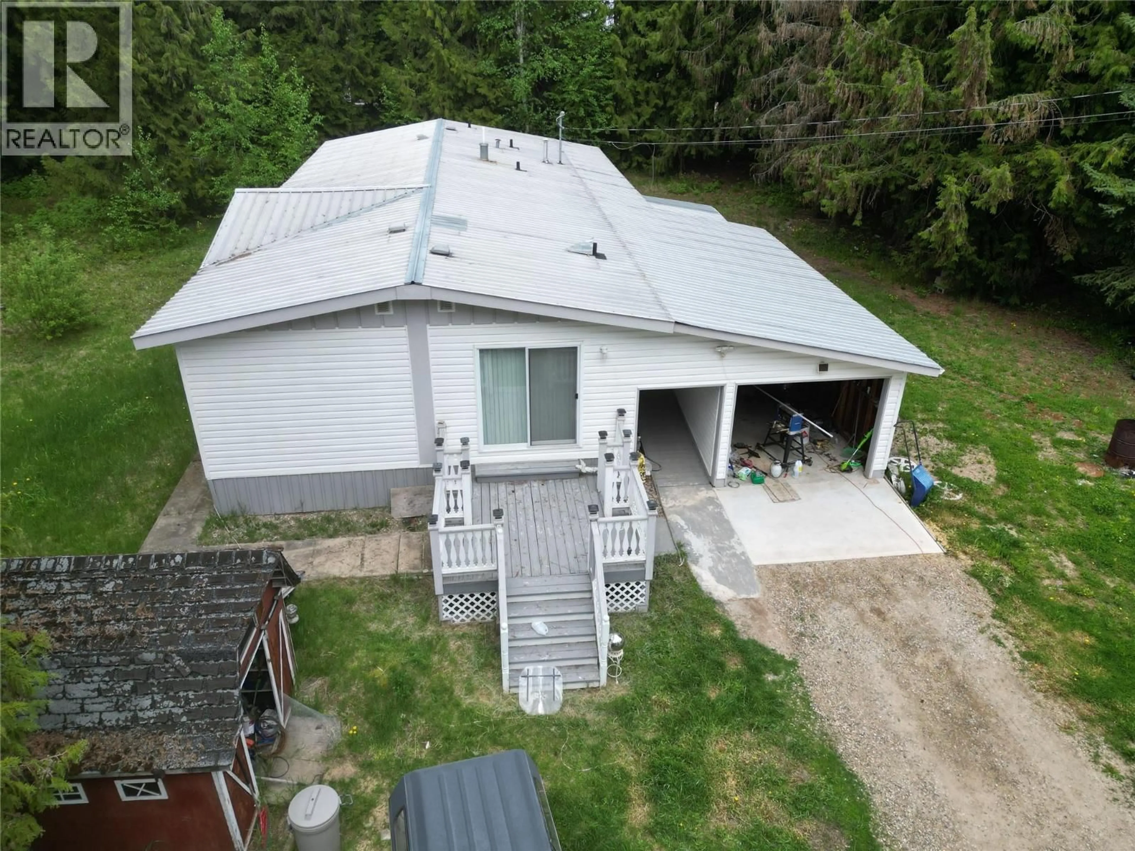 A pic from outside/outdoor area/front of a property/back of a property/a pic from drone, building for 7250 HURST ROAD, Salmon Arm British Columbia V1E2P7