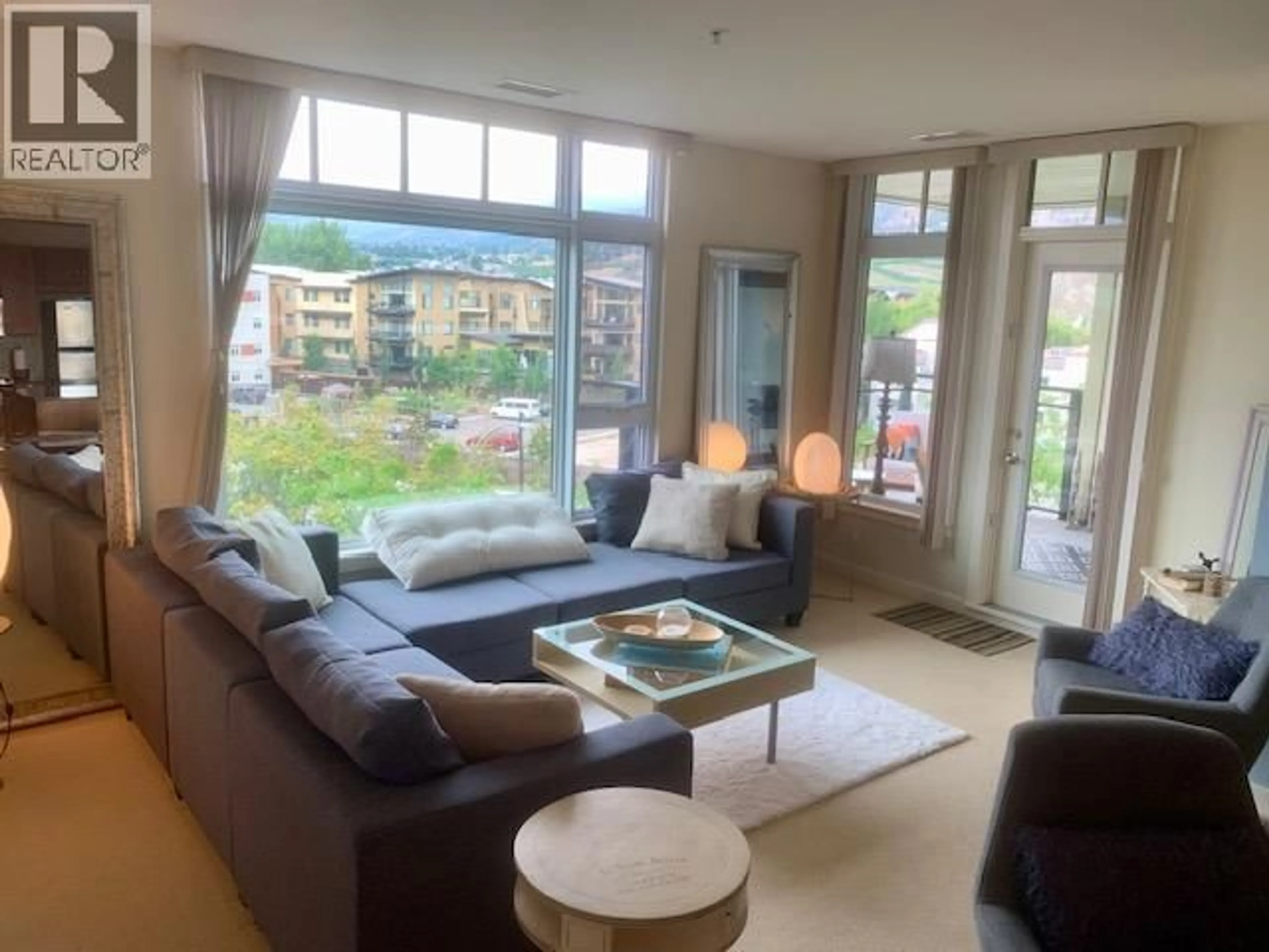 Living room with furniture, unknown for 401 - 3301 SKAHA LAKE ROAD, Penticton British Columbia V2A6G6