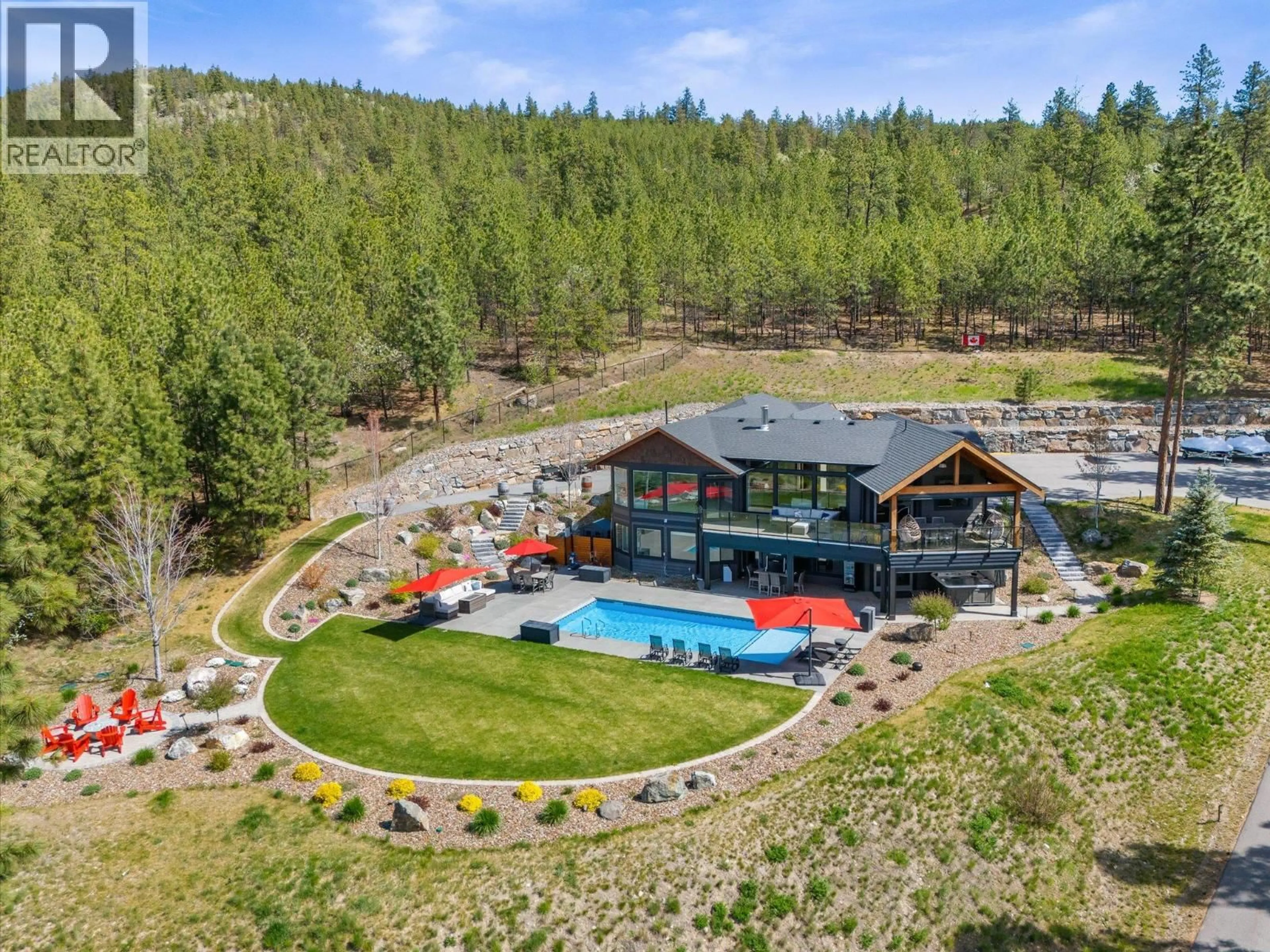 A pic from outside/outdoor area/front of a property/back of a property/a pic from drone, water/lake/river/ocean view for 14405 MOBERLY ROAD, Lake Country British Columbia V4V1A6