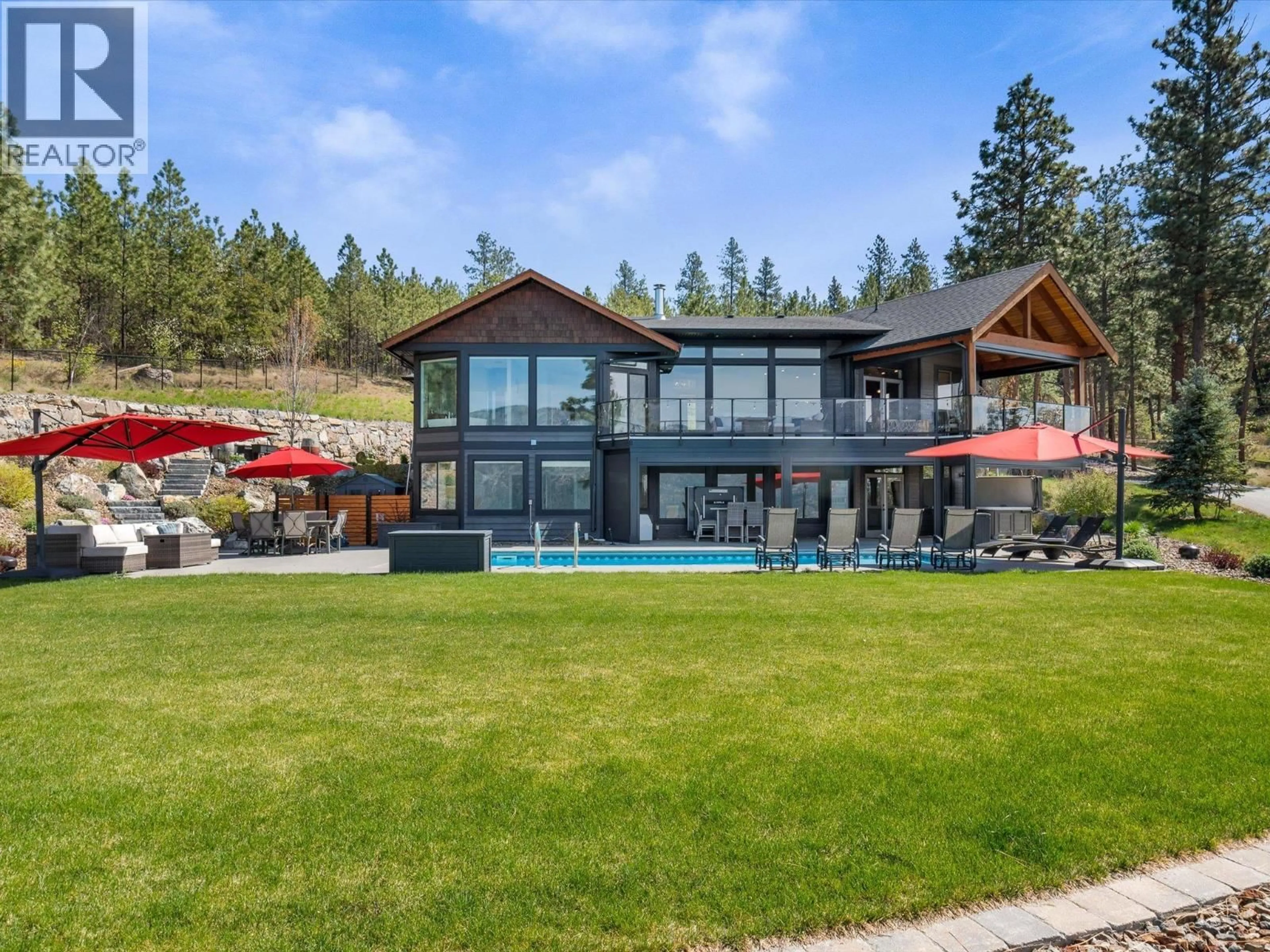 A pic from outside/outdoor area/front of a property/back of a property/a pic from drone, water/lake/river/ocean view for 14405 MOBERLY ROAD, Lake Country British Columbia V4V1A6
