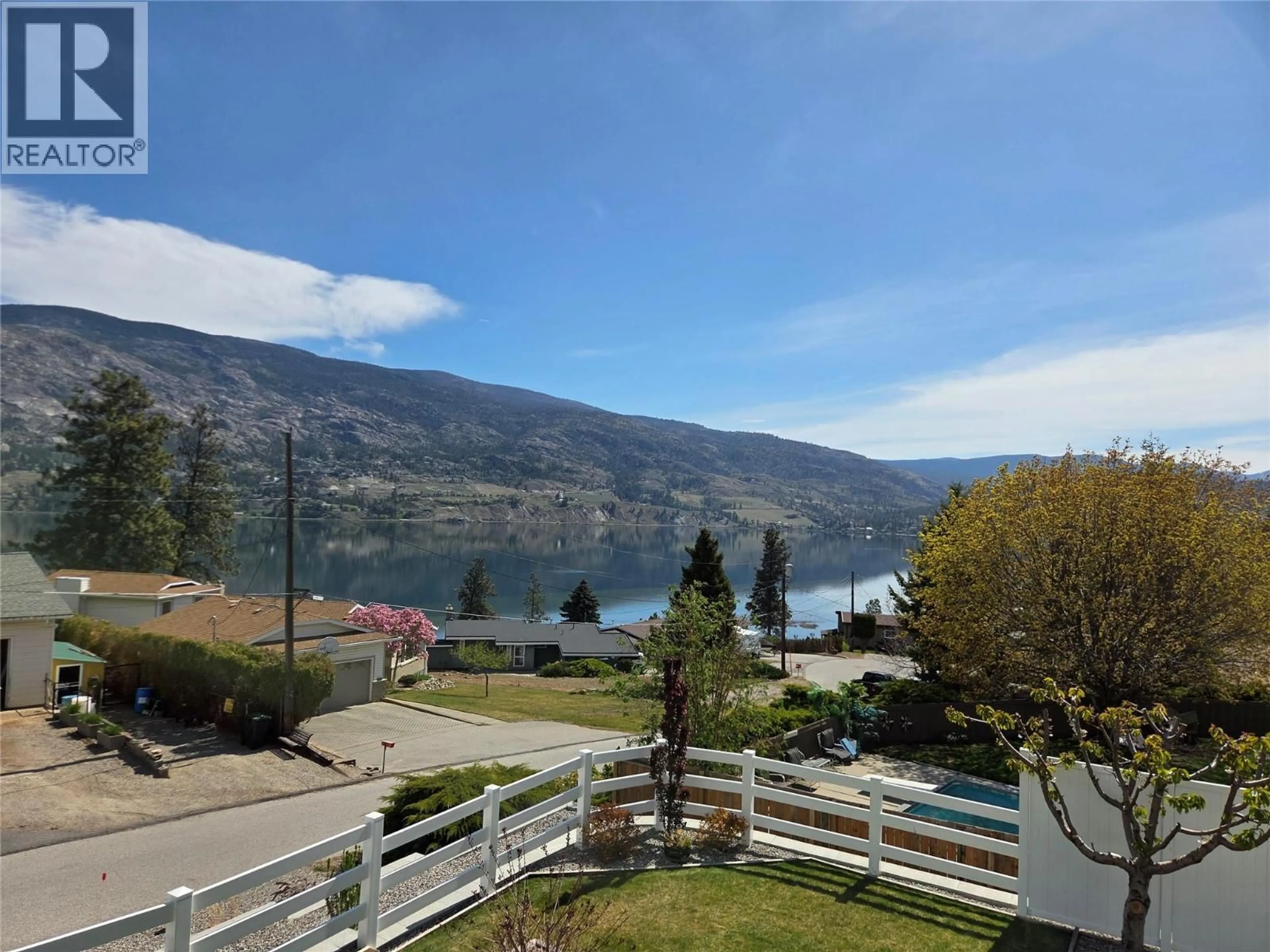 A pic from outside/outdoor area/front of a property/back of a property/a pic from drone, water/lake/river/ocean view for 114 CEDAR AVENUE, Kaleden British Columbia V0H1K0